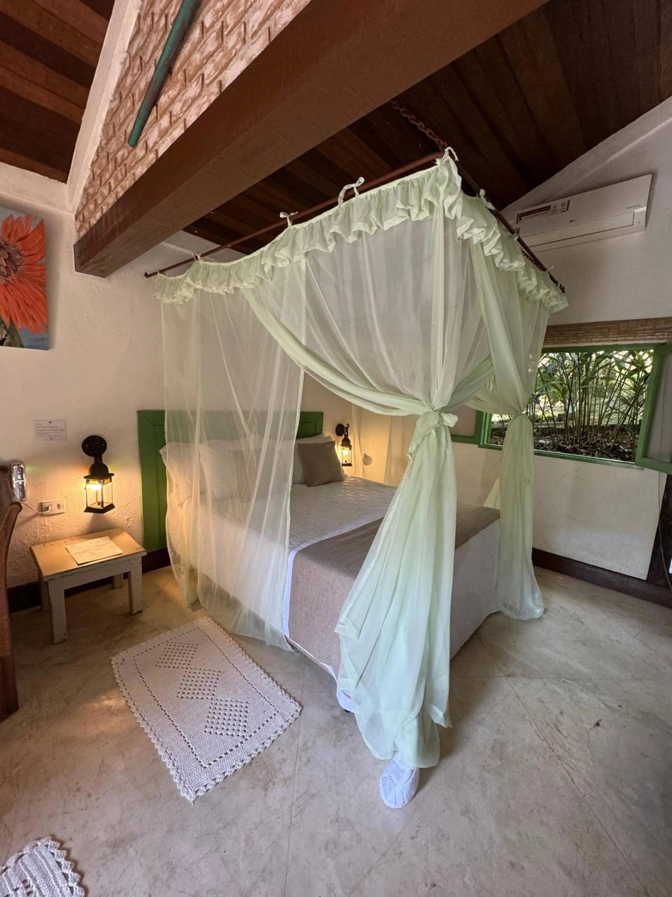 Bed in Pousada Bromélias