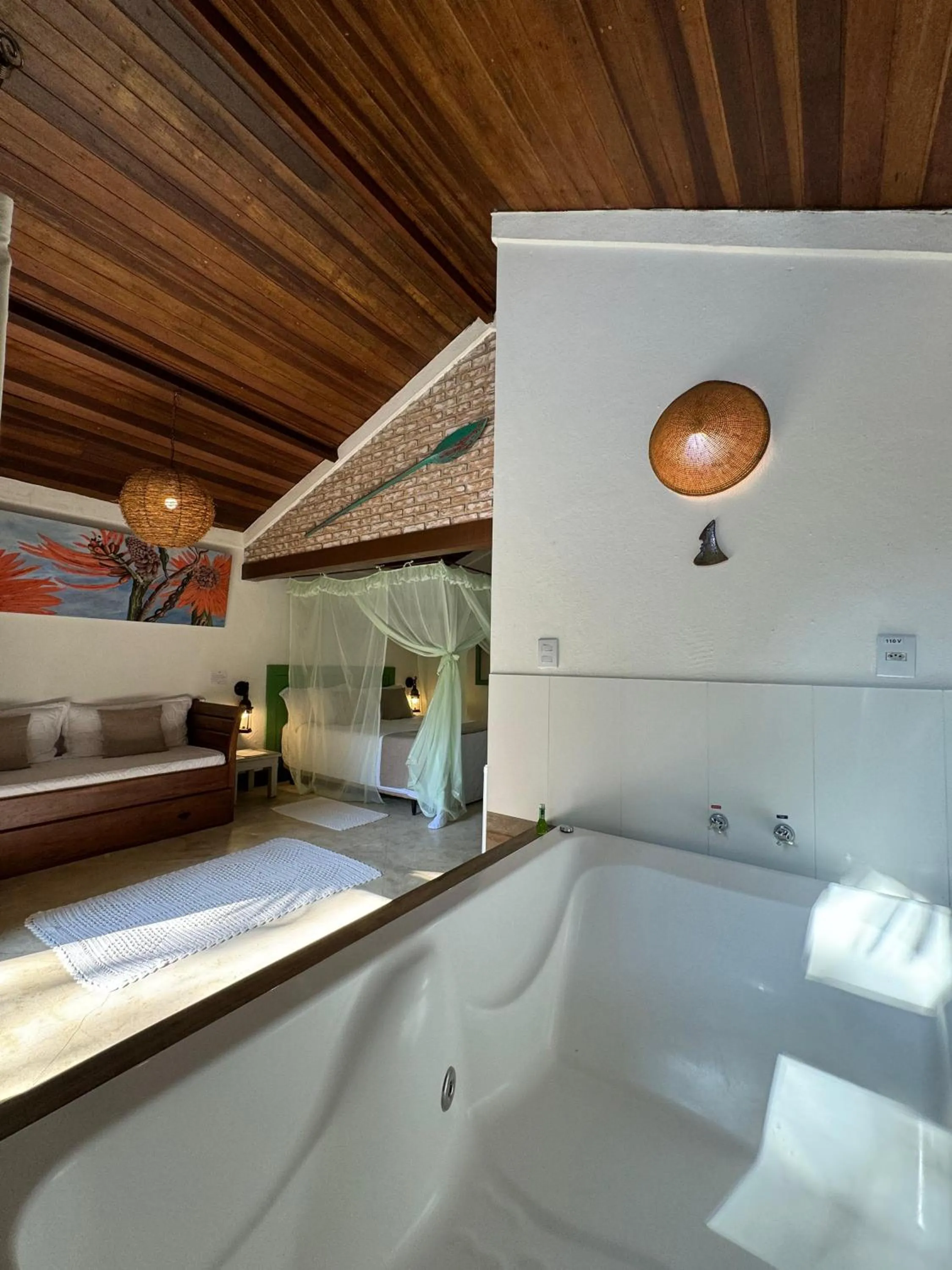 Bedroom in Pousada Bromélias