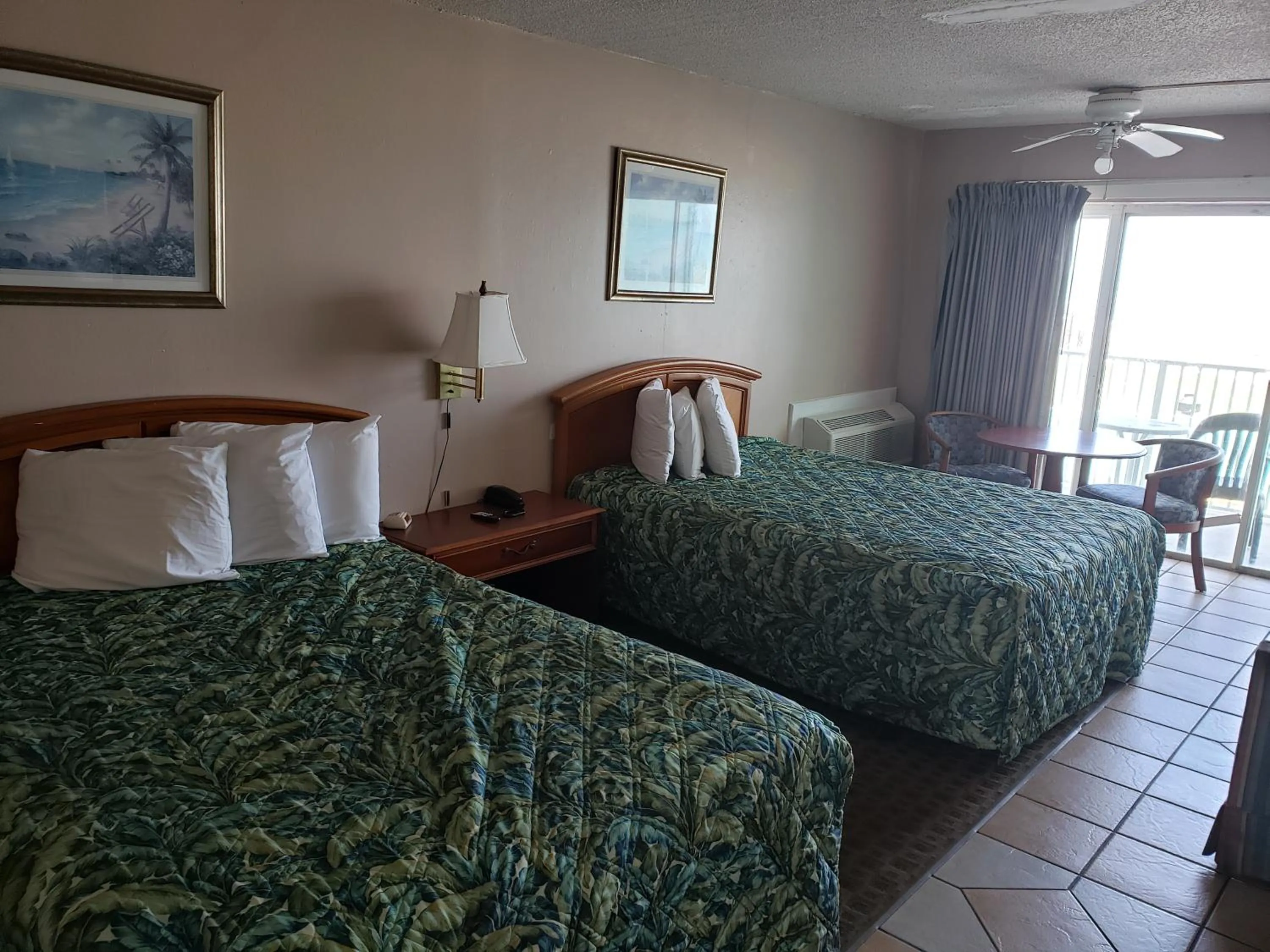 Bed in SeaScape Inn - Daytona Beach Shores