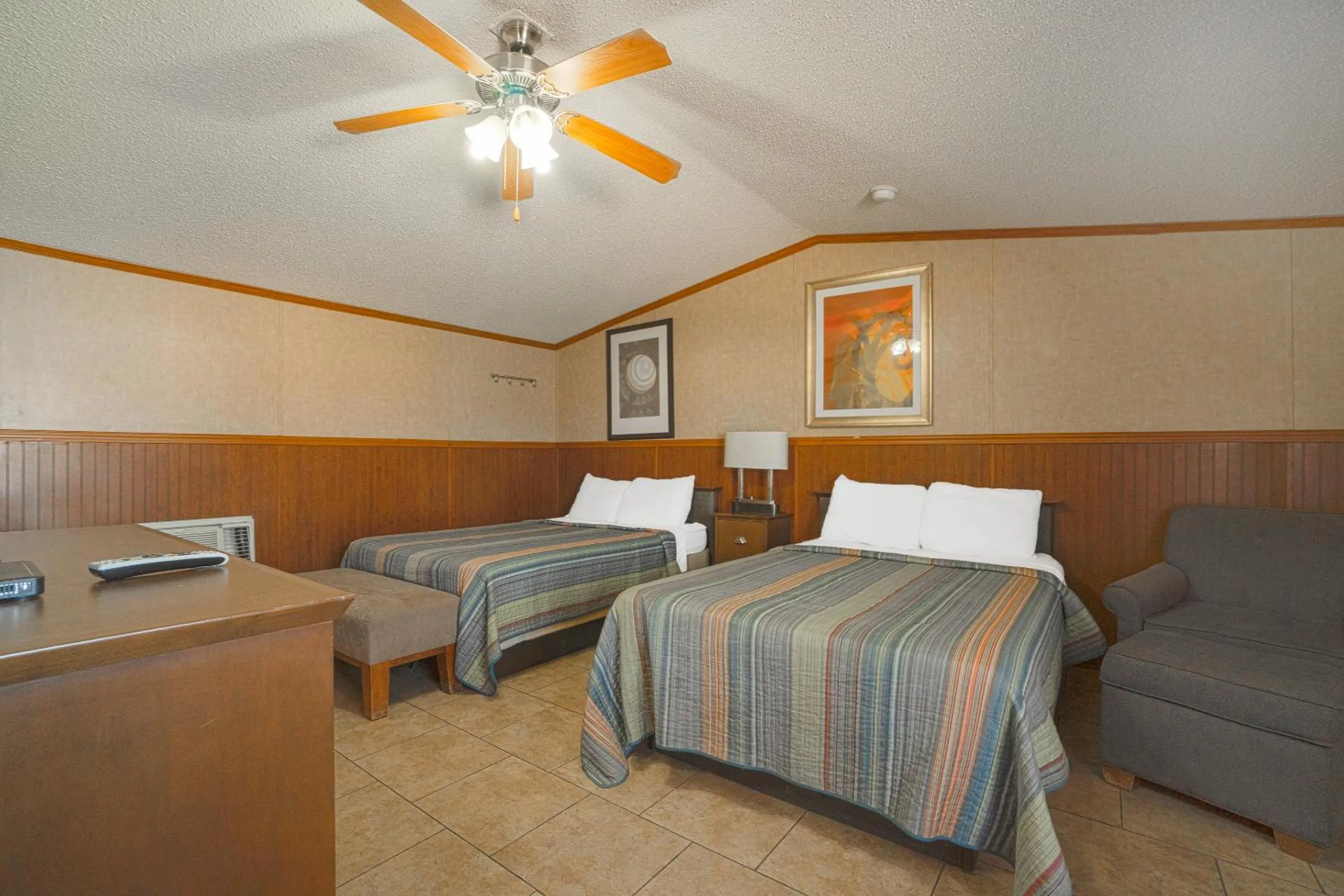 Bedroom in Grand Eagle Ford Lodge & RV Park