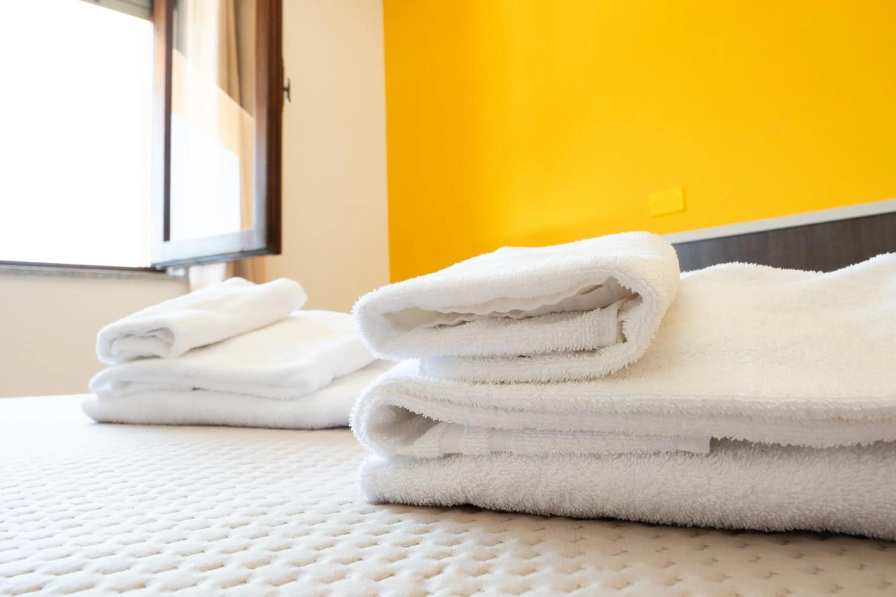 towels, Bed in Hotel Marina
