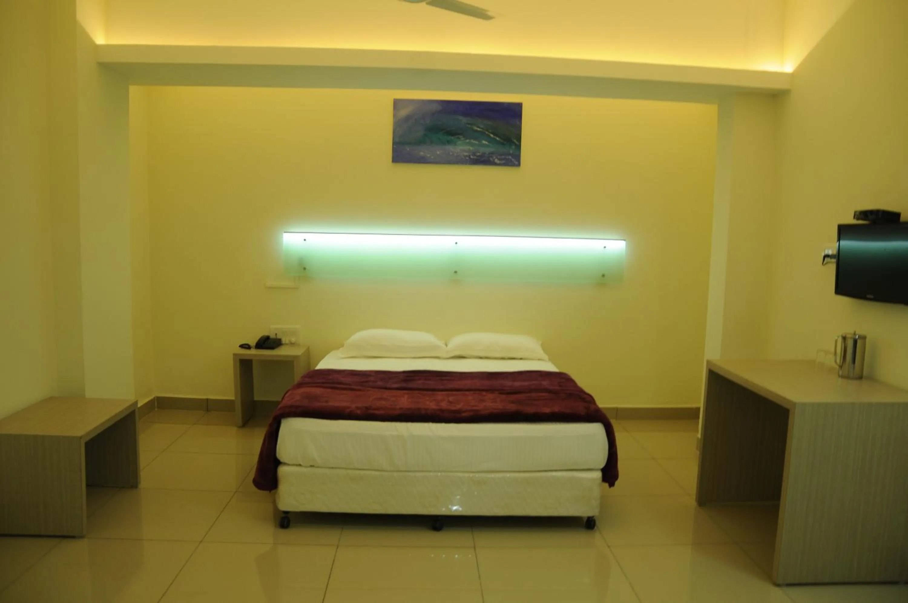 Bed in Cinnamon Residency