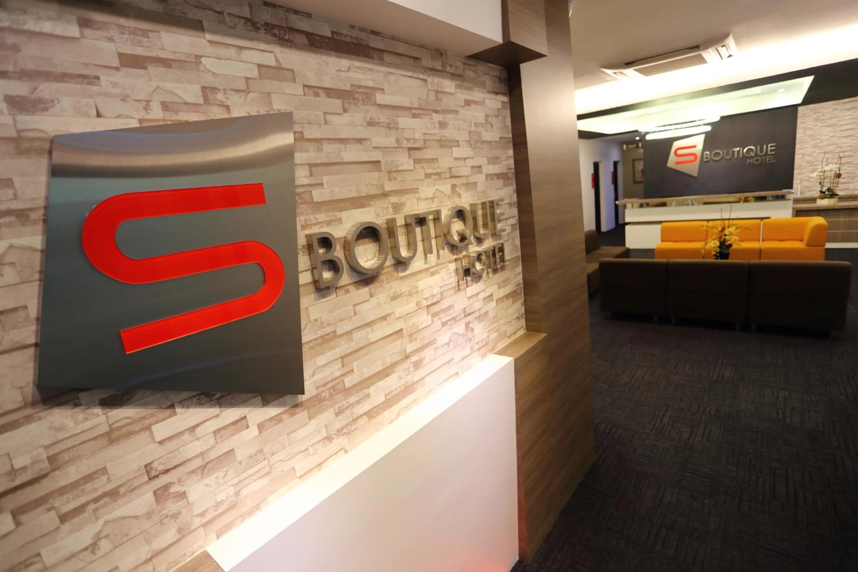 Property logo or sign in S Boutique Hotel