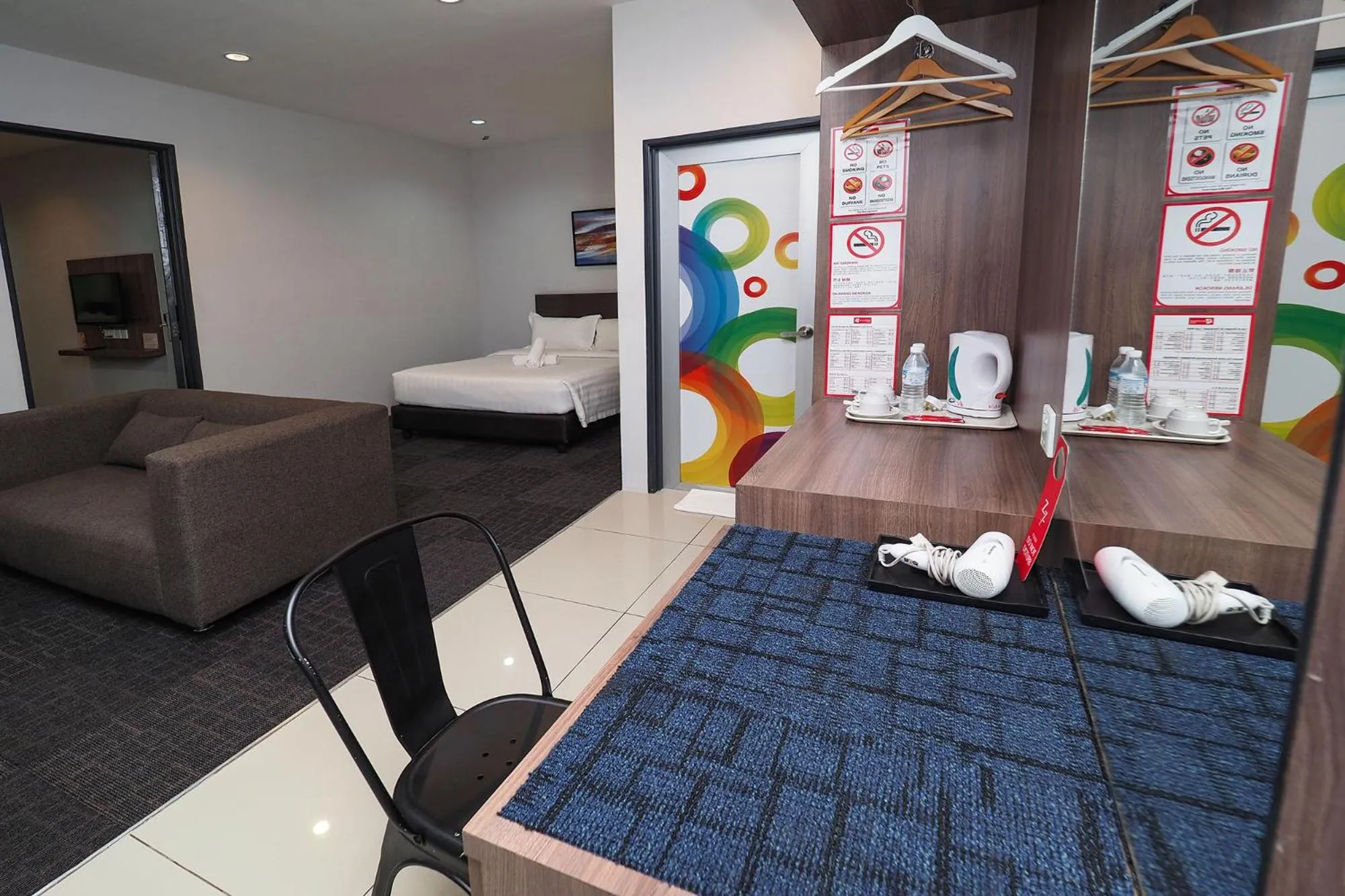 Seating area, Bed in S Boutique Hotel