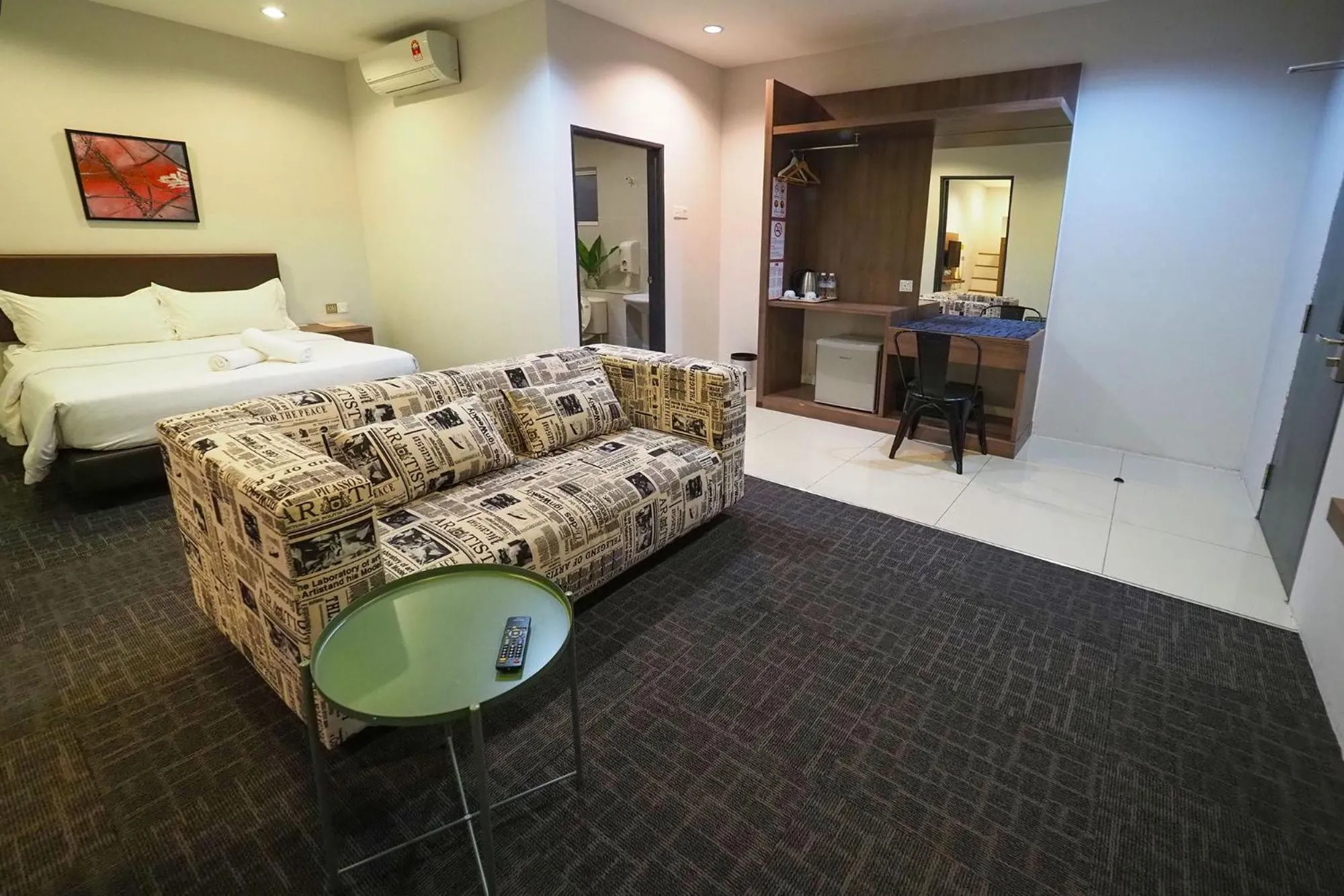 Living room, Bed in S Boutique Hotel