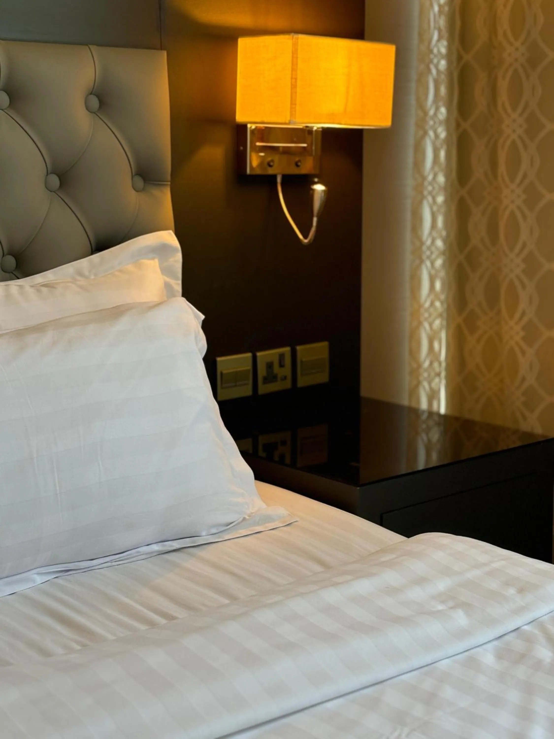 Bed in Sama Inn Hotel