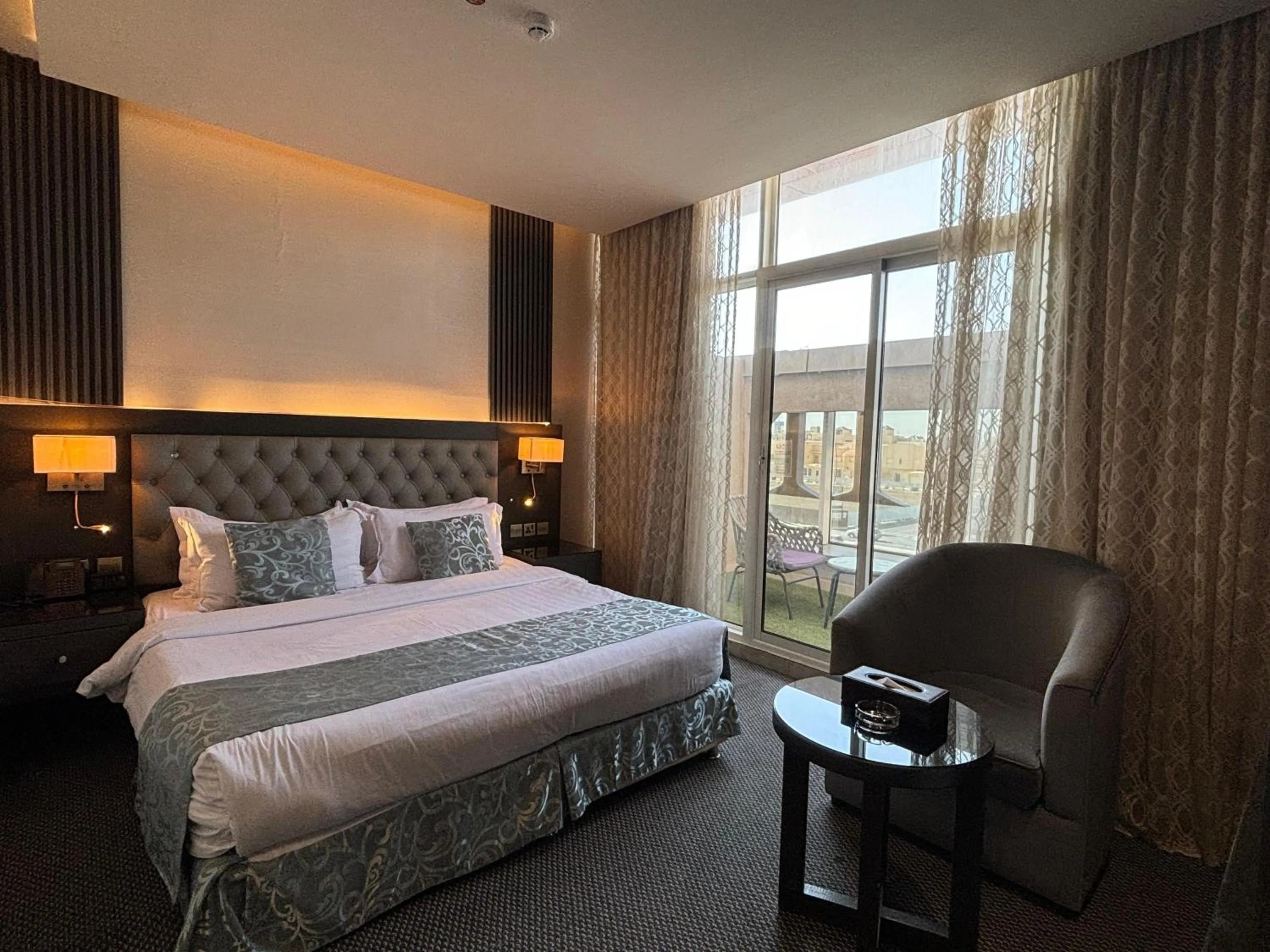 Bed in Sama Inn Hotel