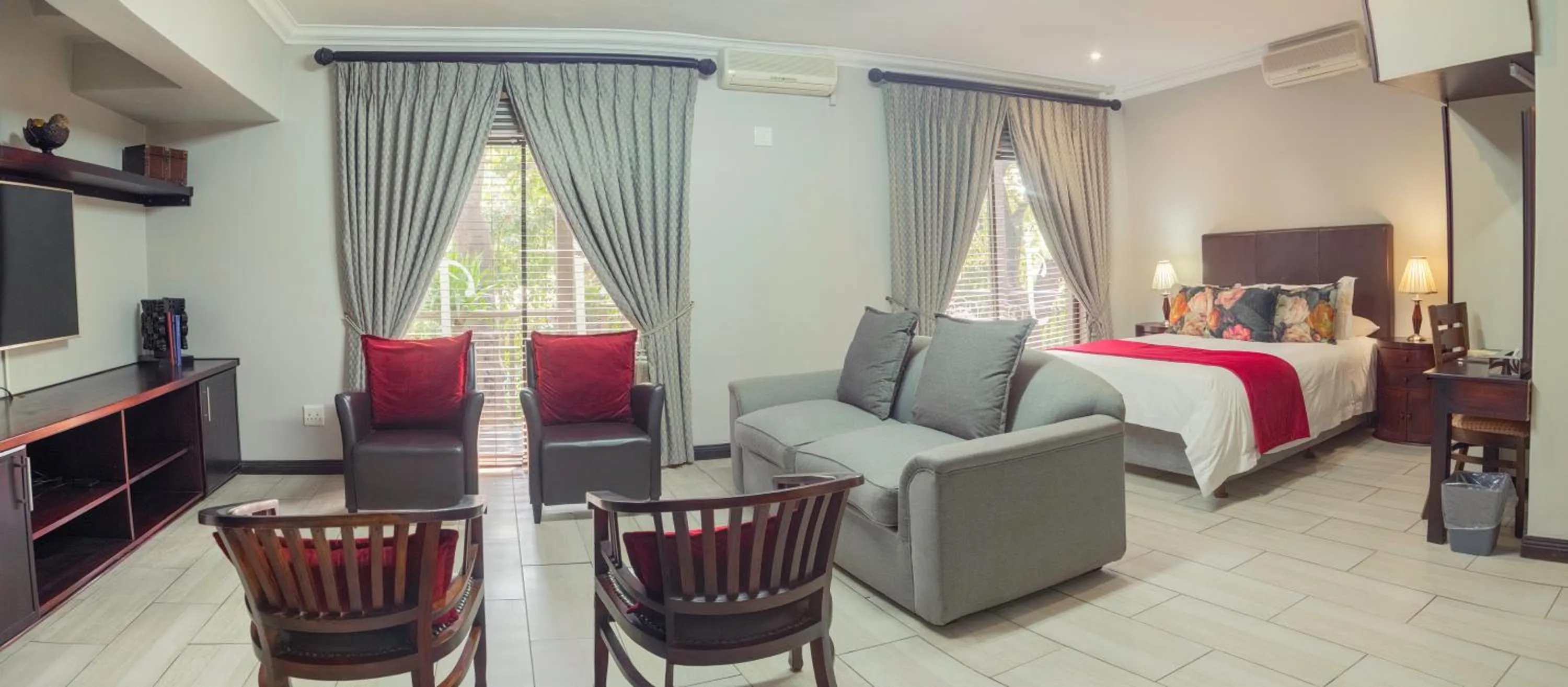 Photo of the whole room, Bed in InnJoy Boutique Hotel