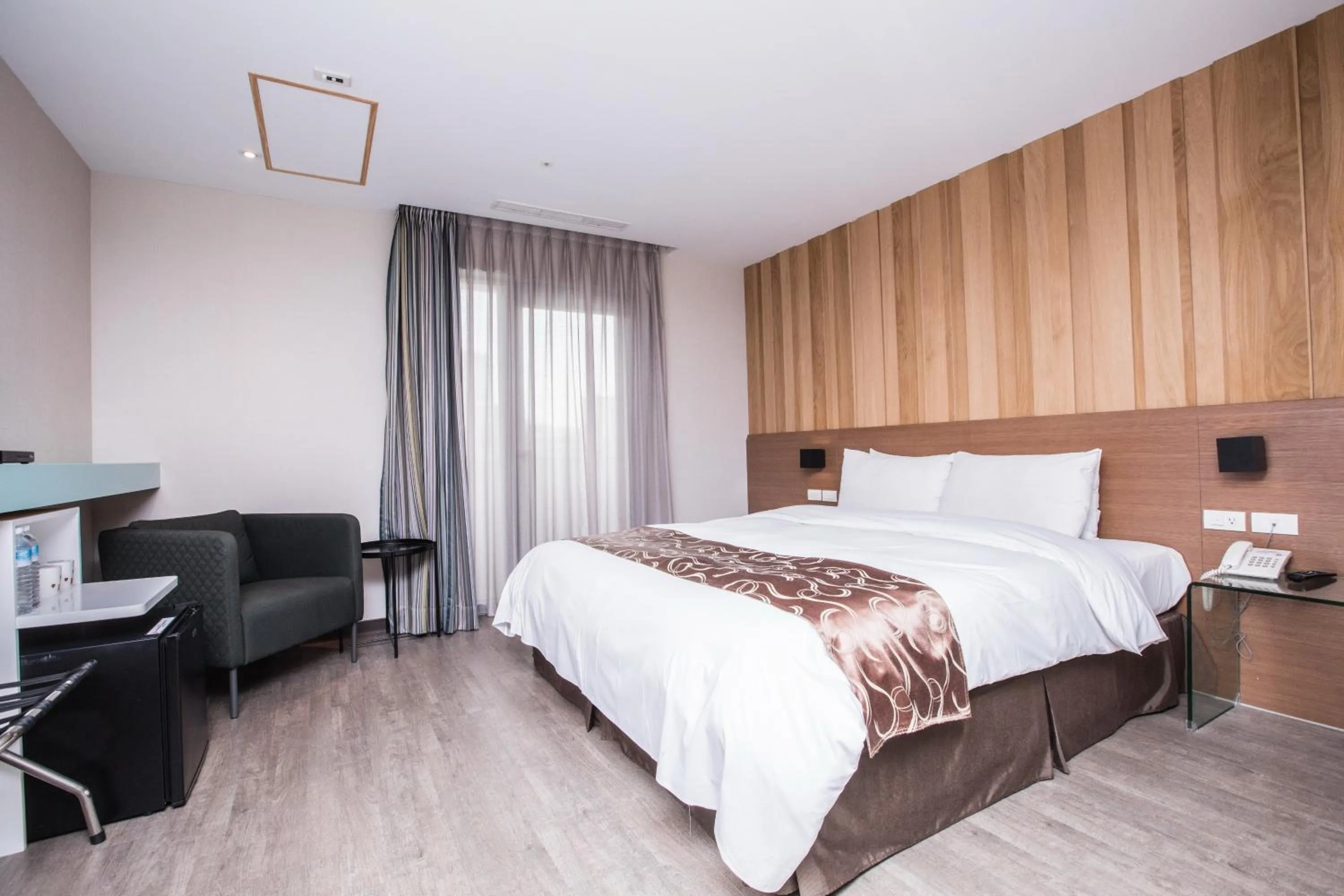 Bed in Travel Art Inn