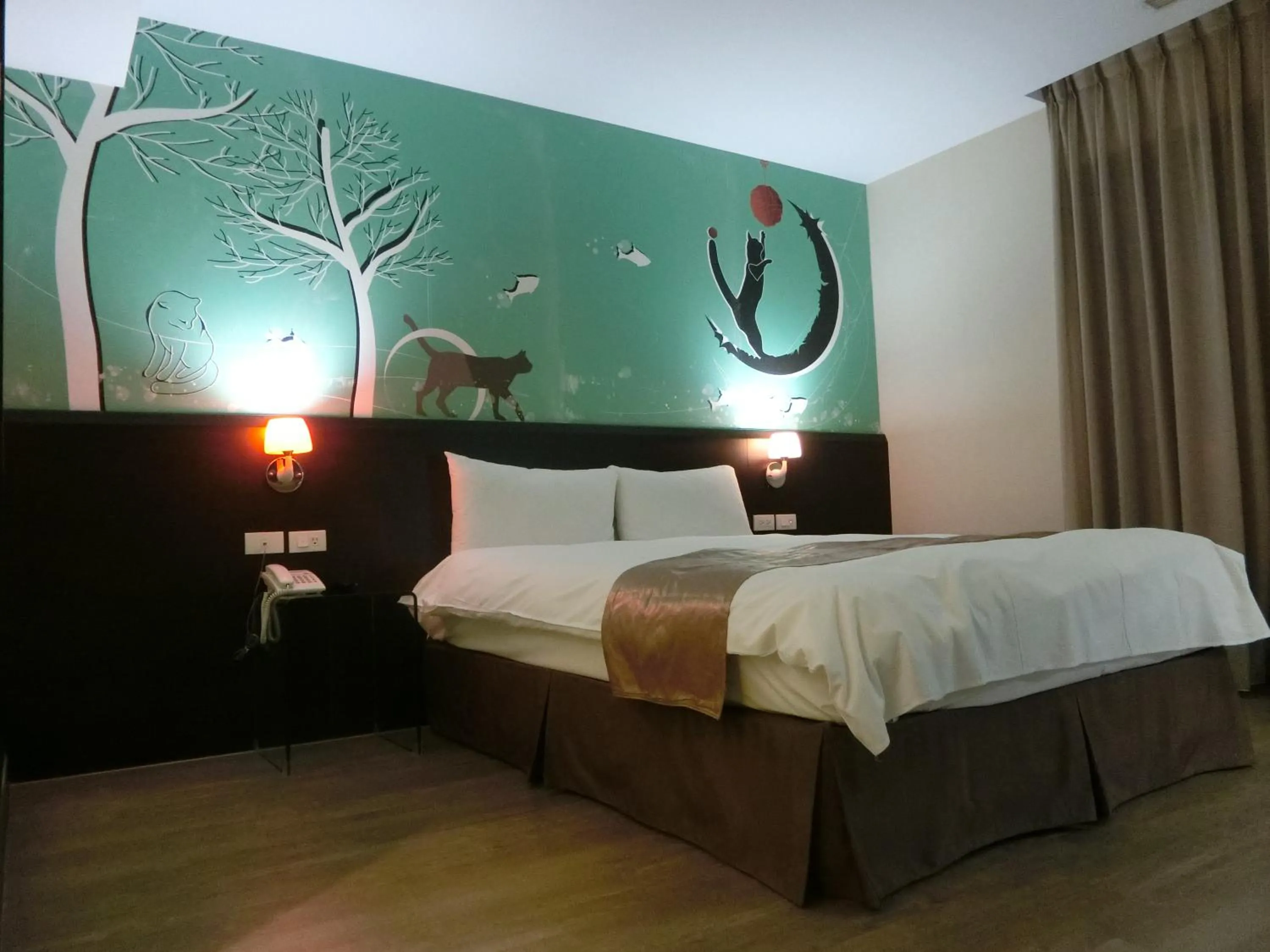 Bed in Travel Art Inn