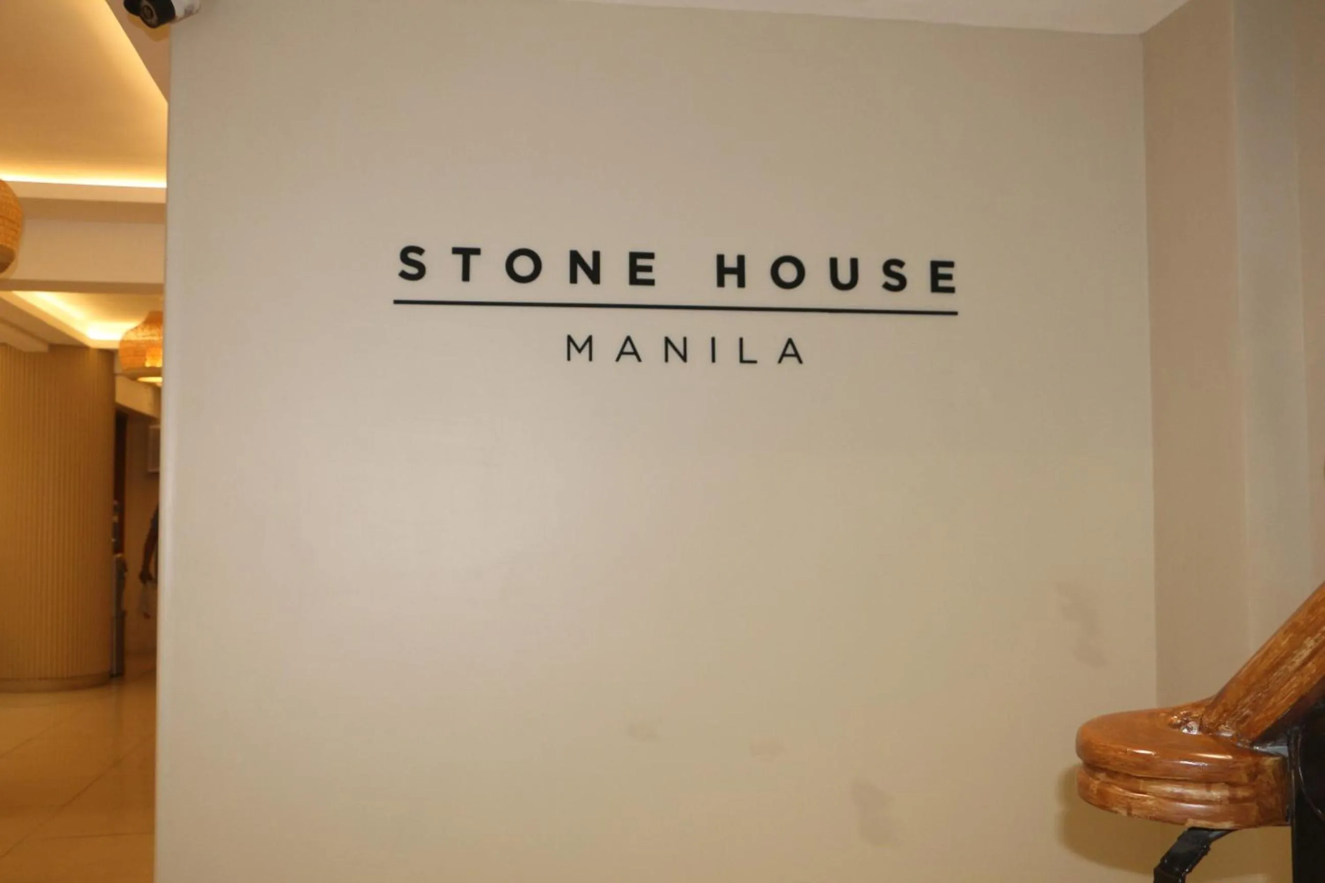 Property logo or sign in Stone House Hotel Manila