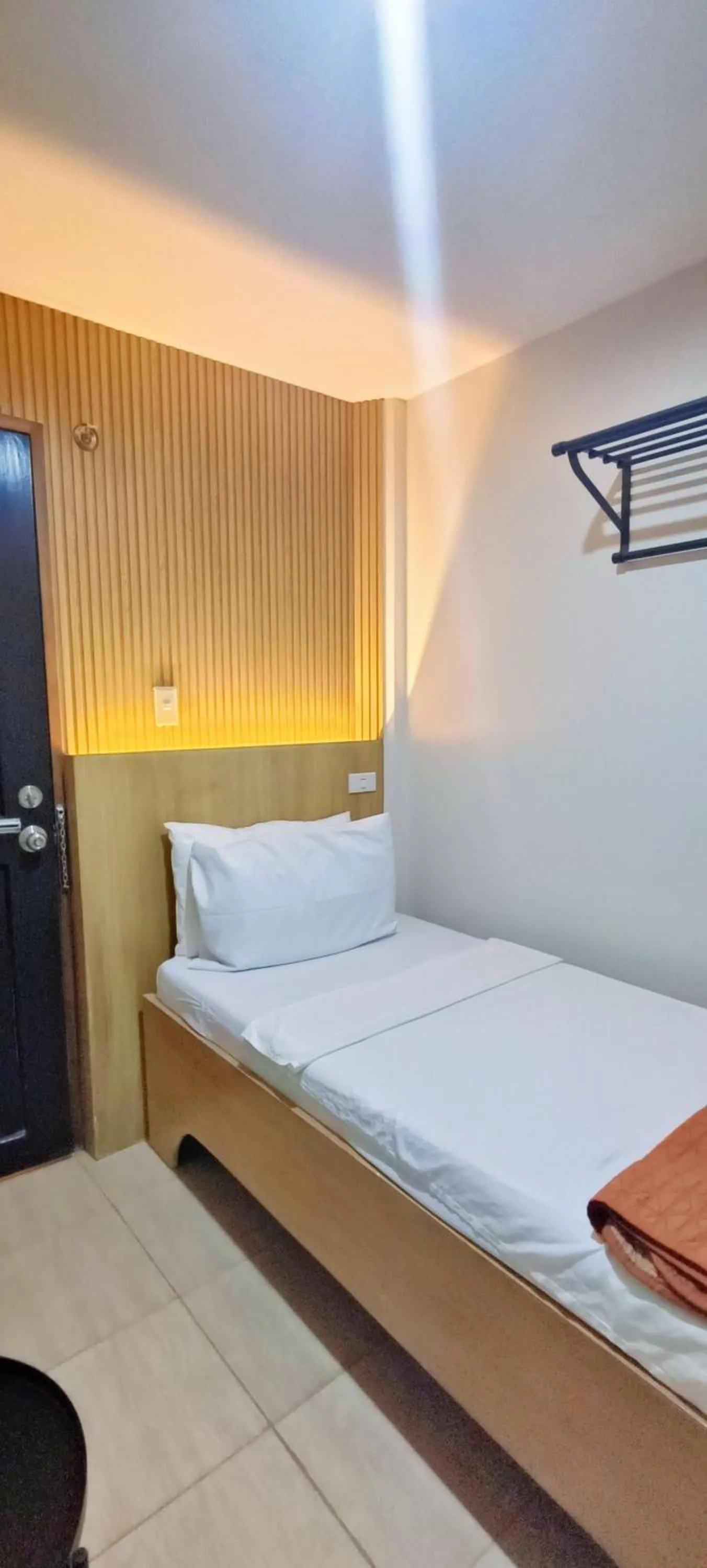 Bed in Stone House Hotel Manila