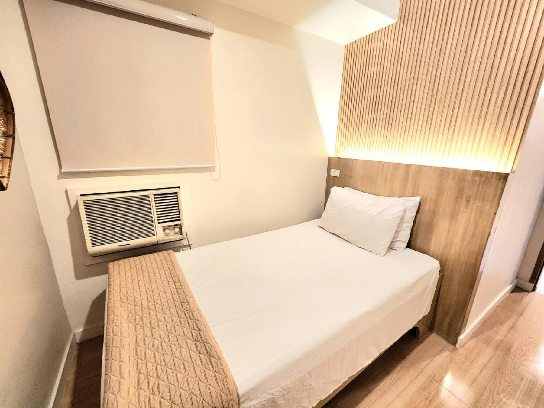 Bed in Stone House Hotel Manila