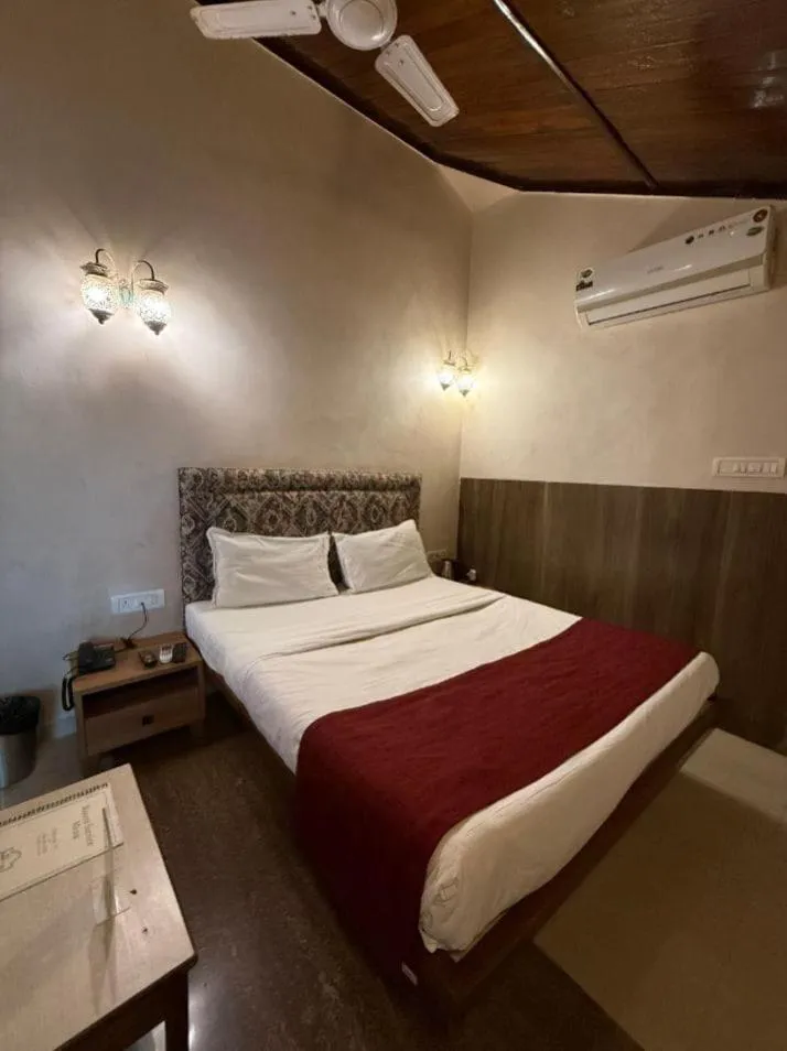 Bed in Hotel Beach Garden