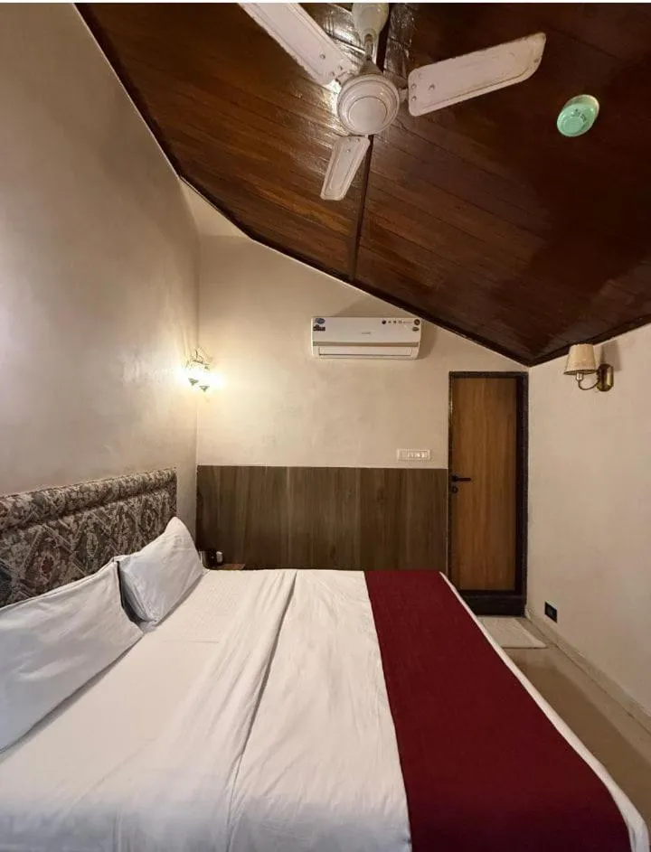 Bed in Hotel Beach Garden