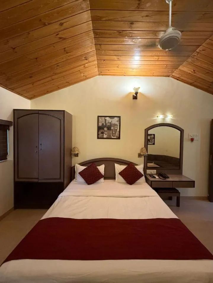 Bed in Hotel Beach Garden