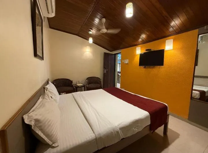 Bed in Hotel Beach Garden