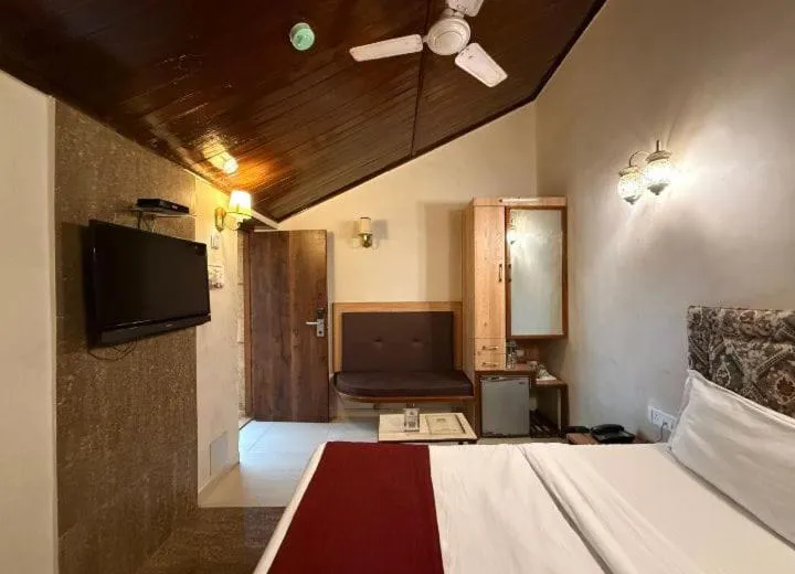 Bed in Hotel Beach Garden