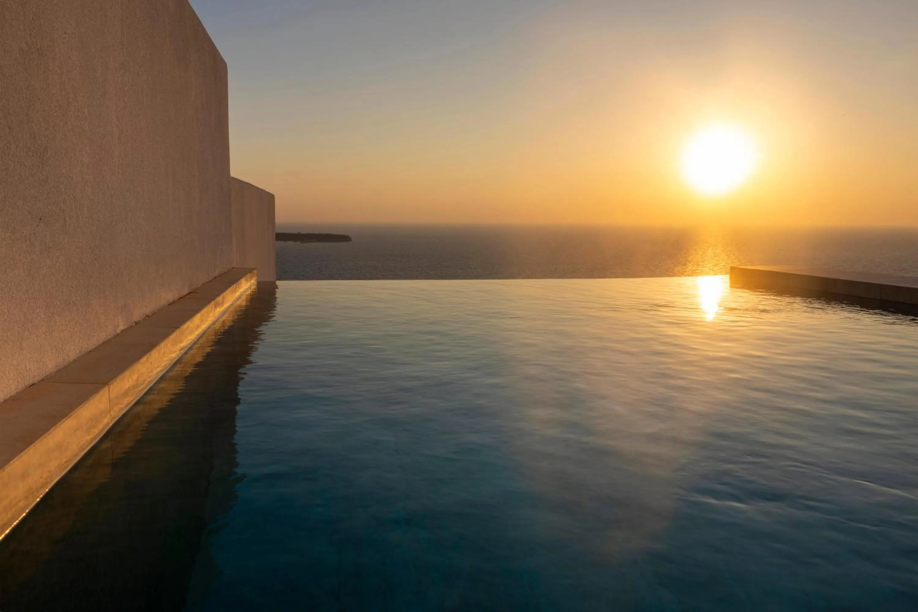 Sunset in Santo Pure Oia Suites & Villas
