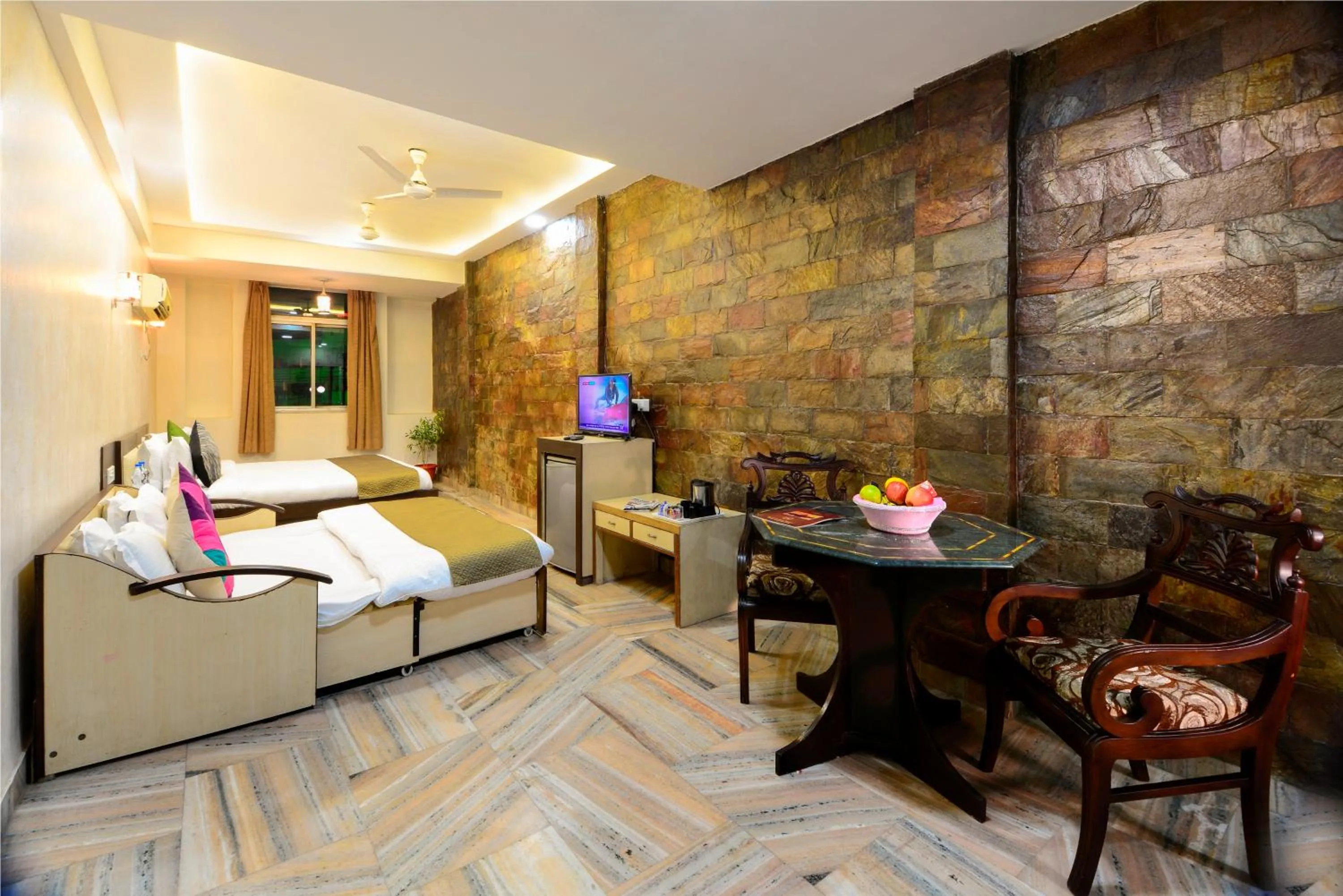 Living room, Bed in Hotel Ashish Palace