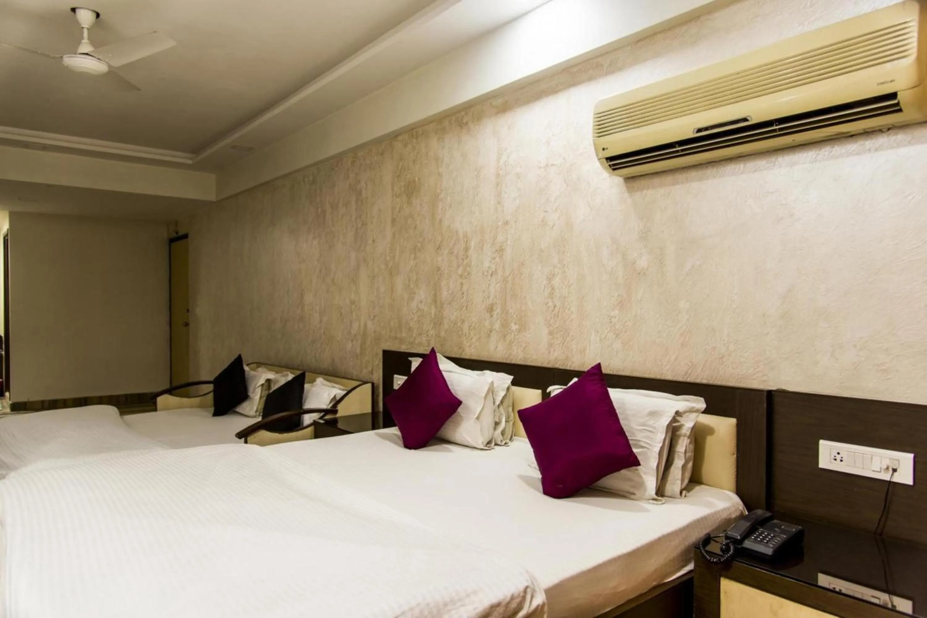 Living room, Bed in Hotel Ashish Palace