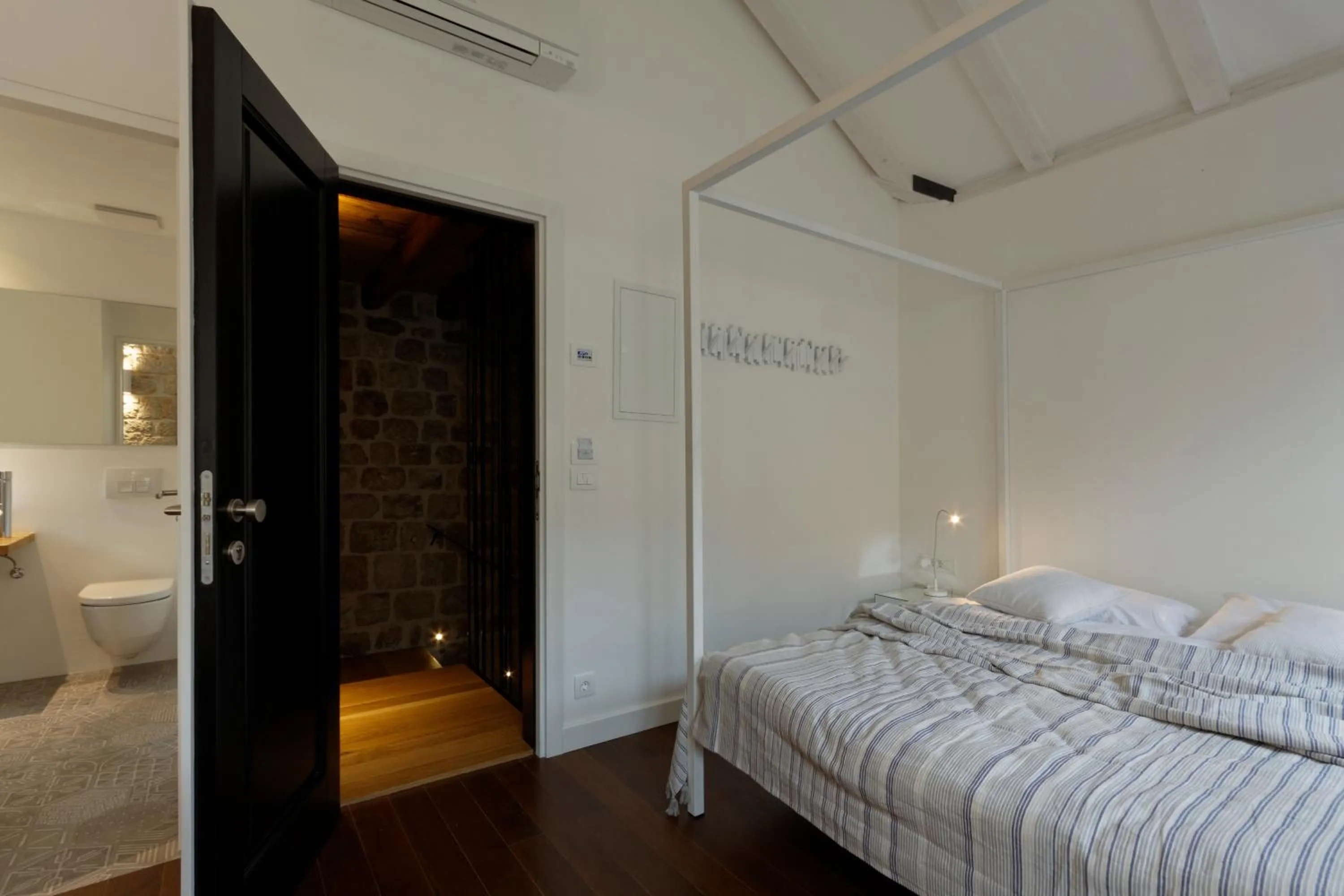 Bed in Apartments Eleganca