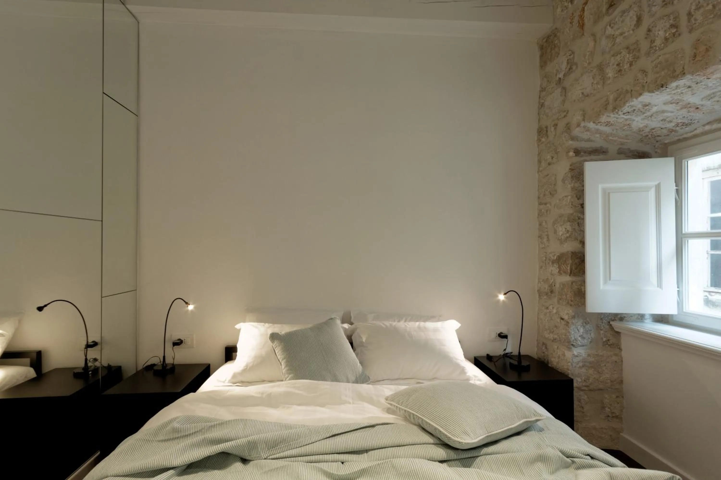 Bed in Apartments Eleganca