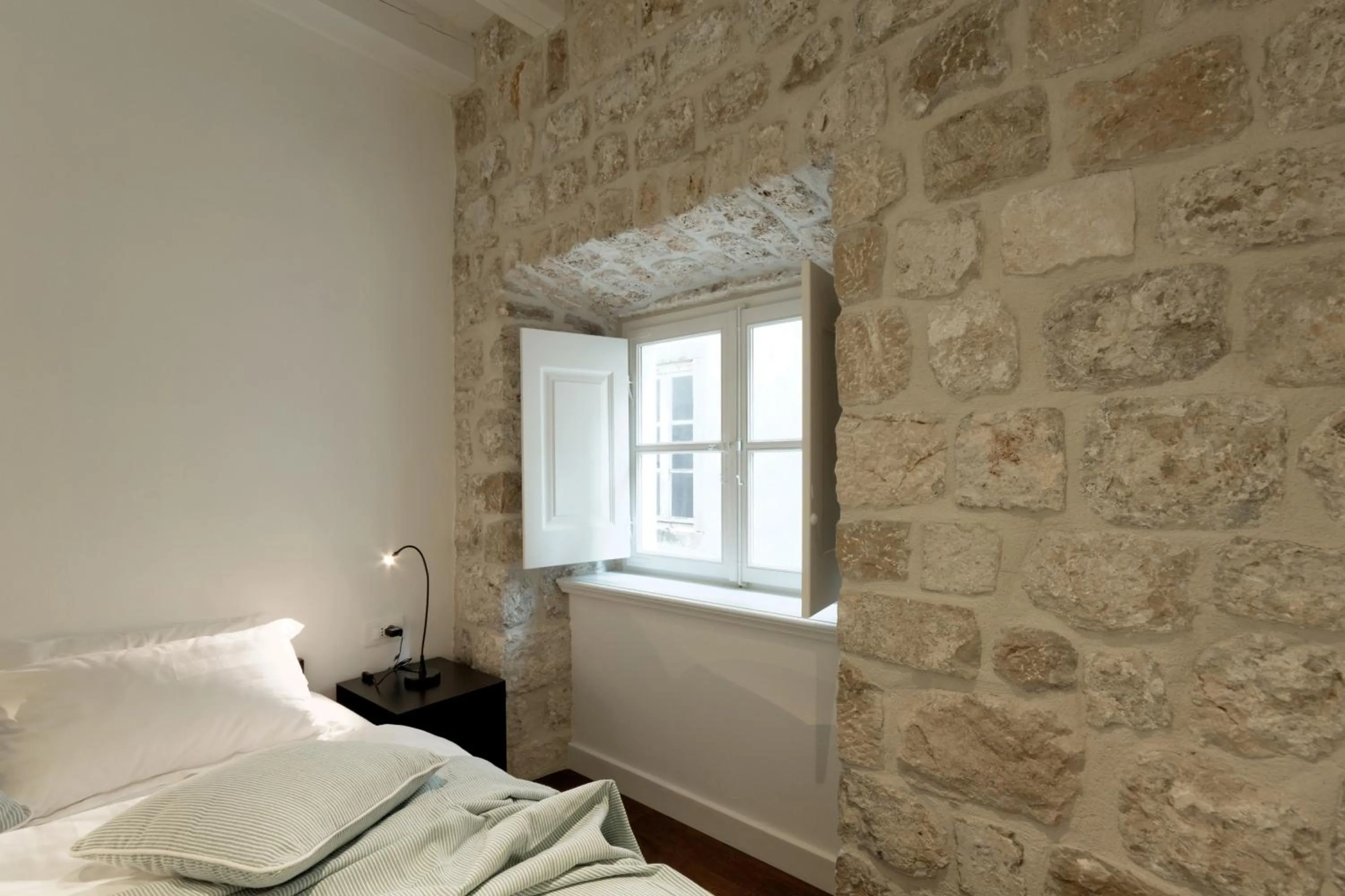 Bed in Apartments Eleganca