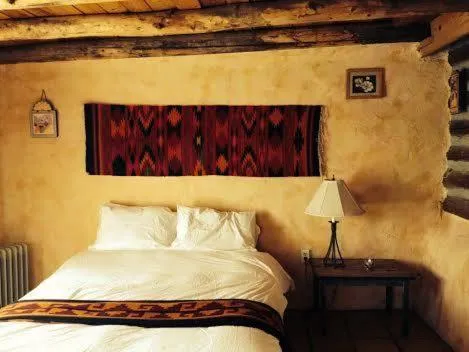 Bed in Taos Goji Farm & Eco-Lodge Retreat