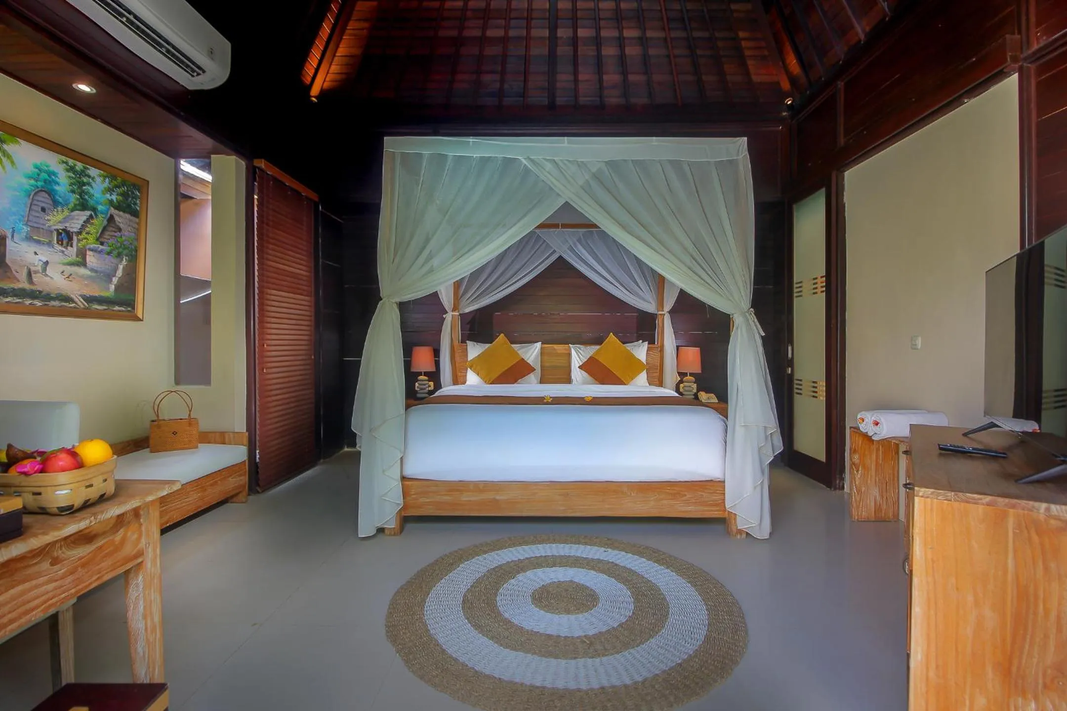 Bed in d'Nusa Beach Club and Resort