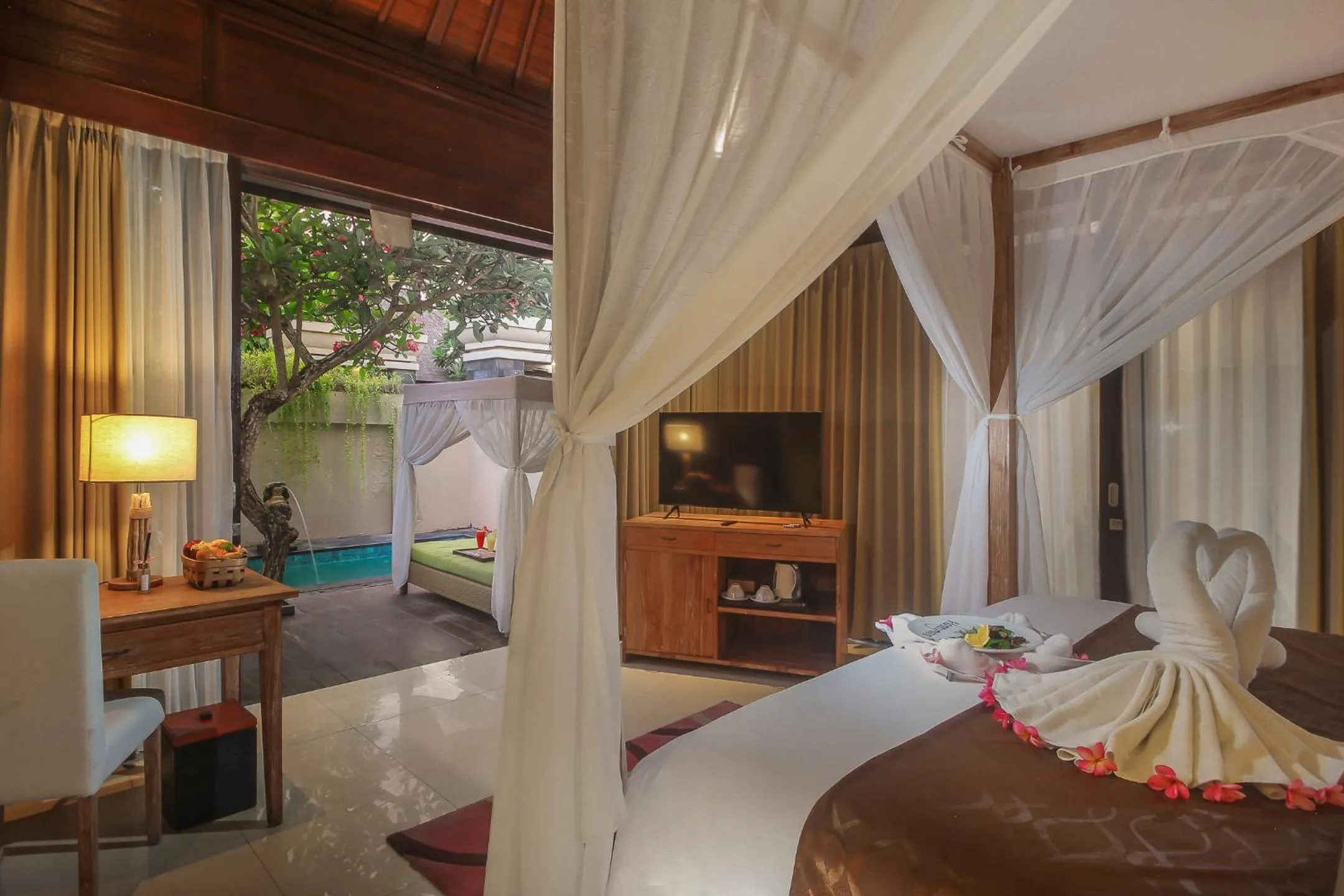 Bed in d'Nusa Beach Club and Resort