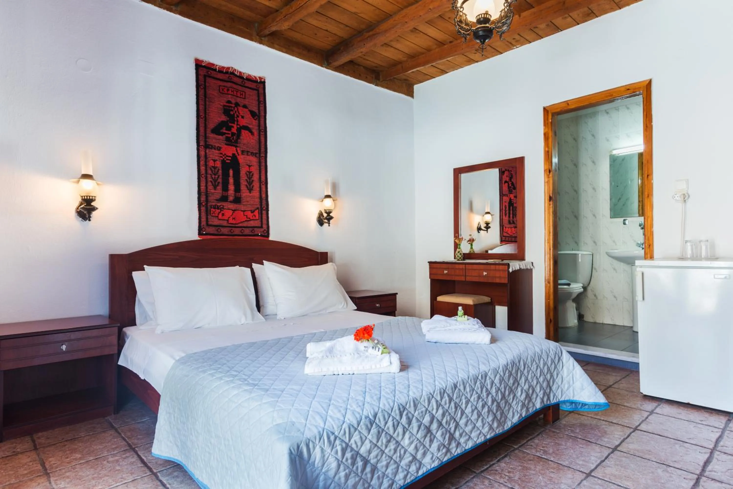 Bed in Daskalogiannis Hotel