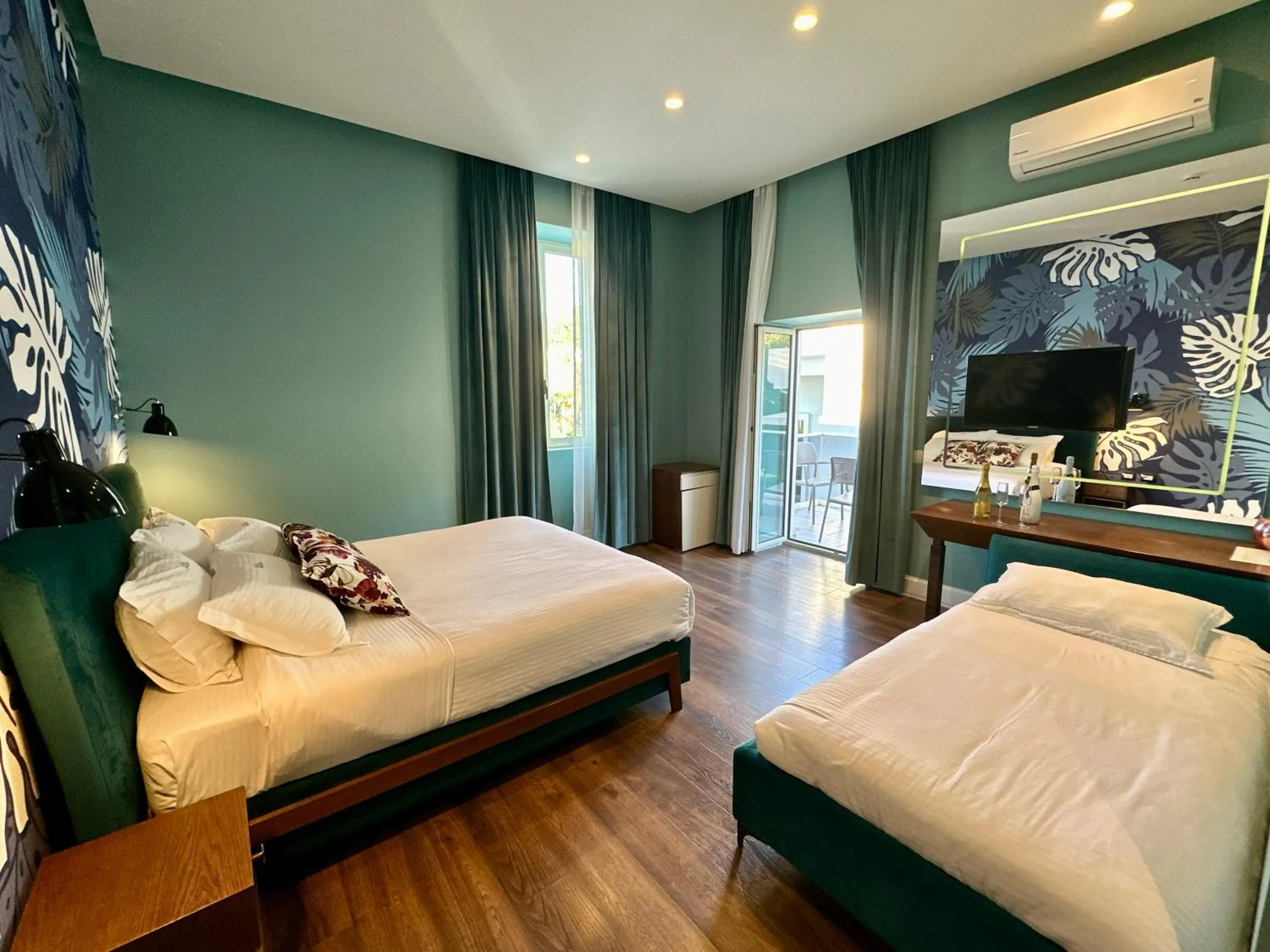 Bed in Le Palazzine Hotel