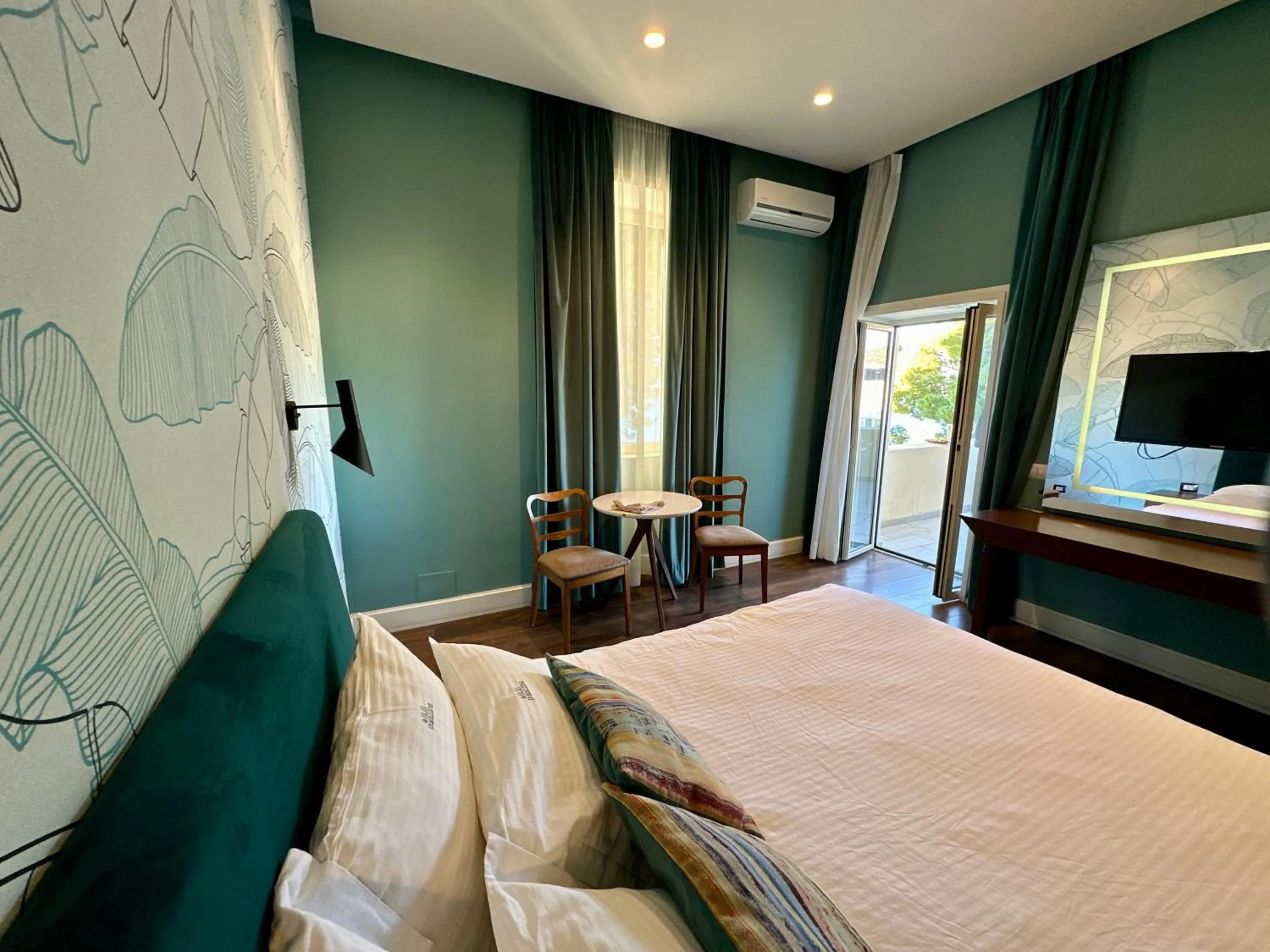 Bed in Le Palazzine Hotel