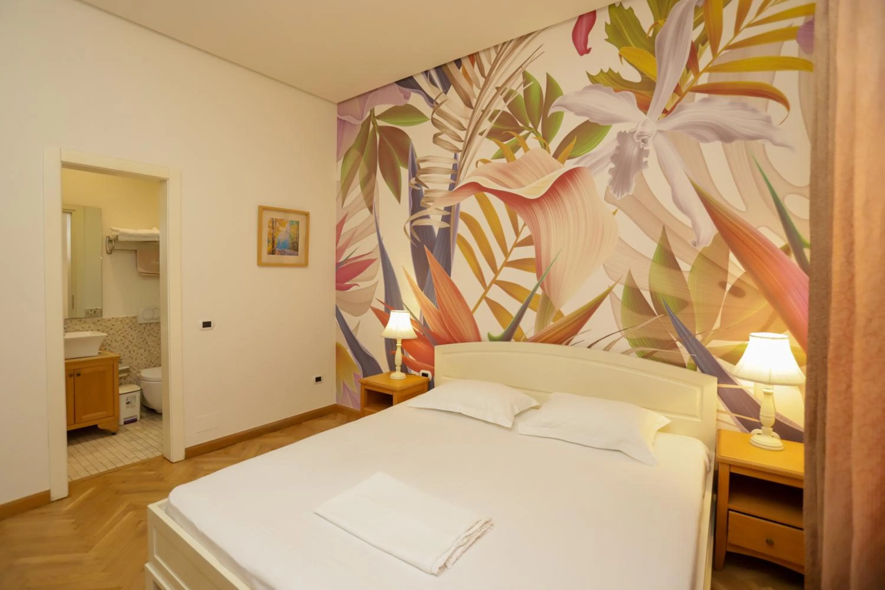 Bed in Le Palazzine Hotel