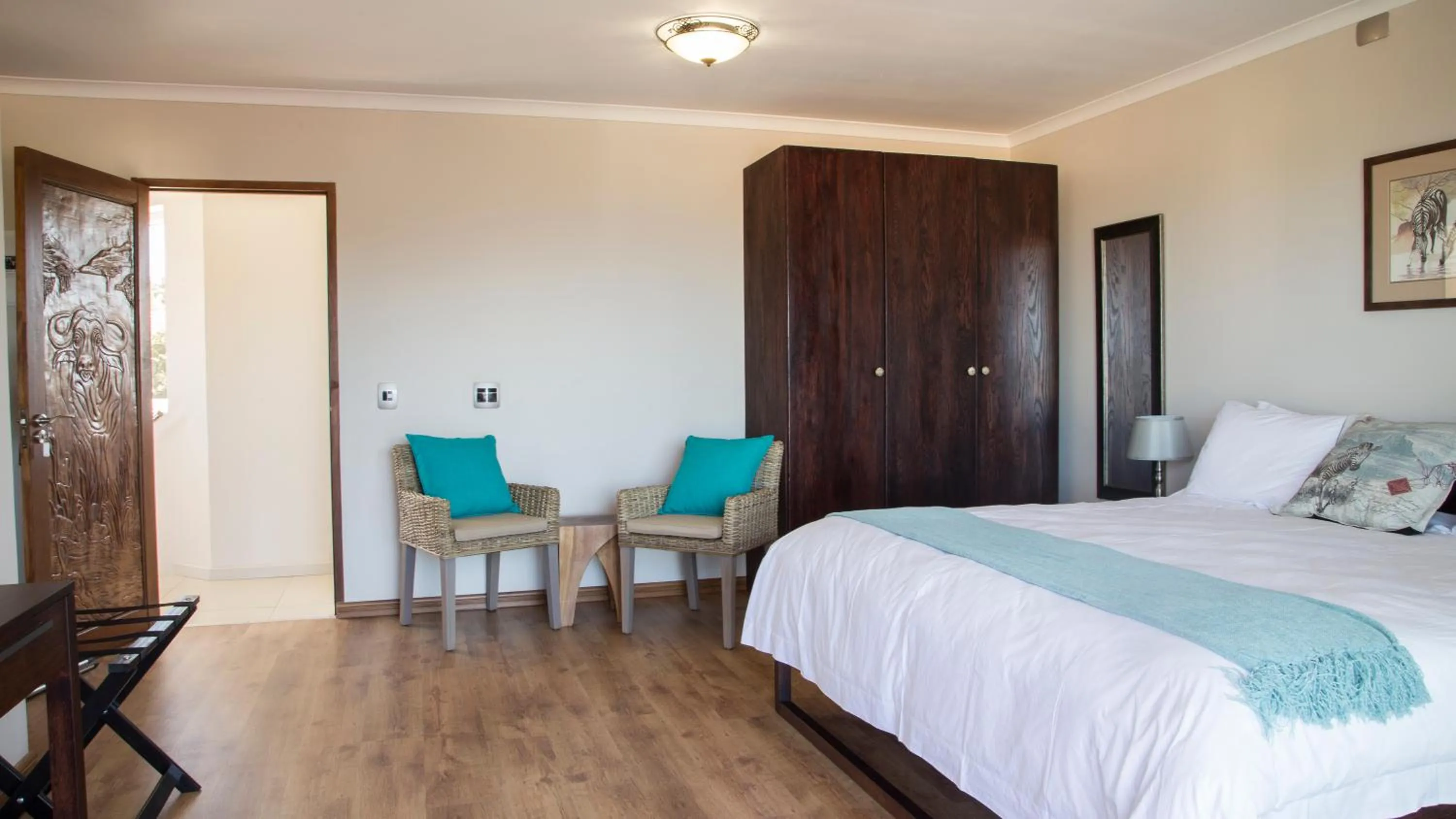 Seating area, Bed in Lala Panzi B&B