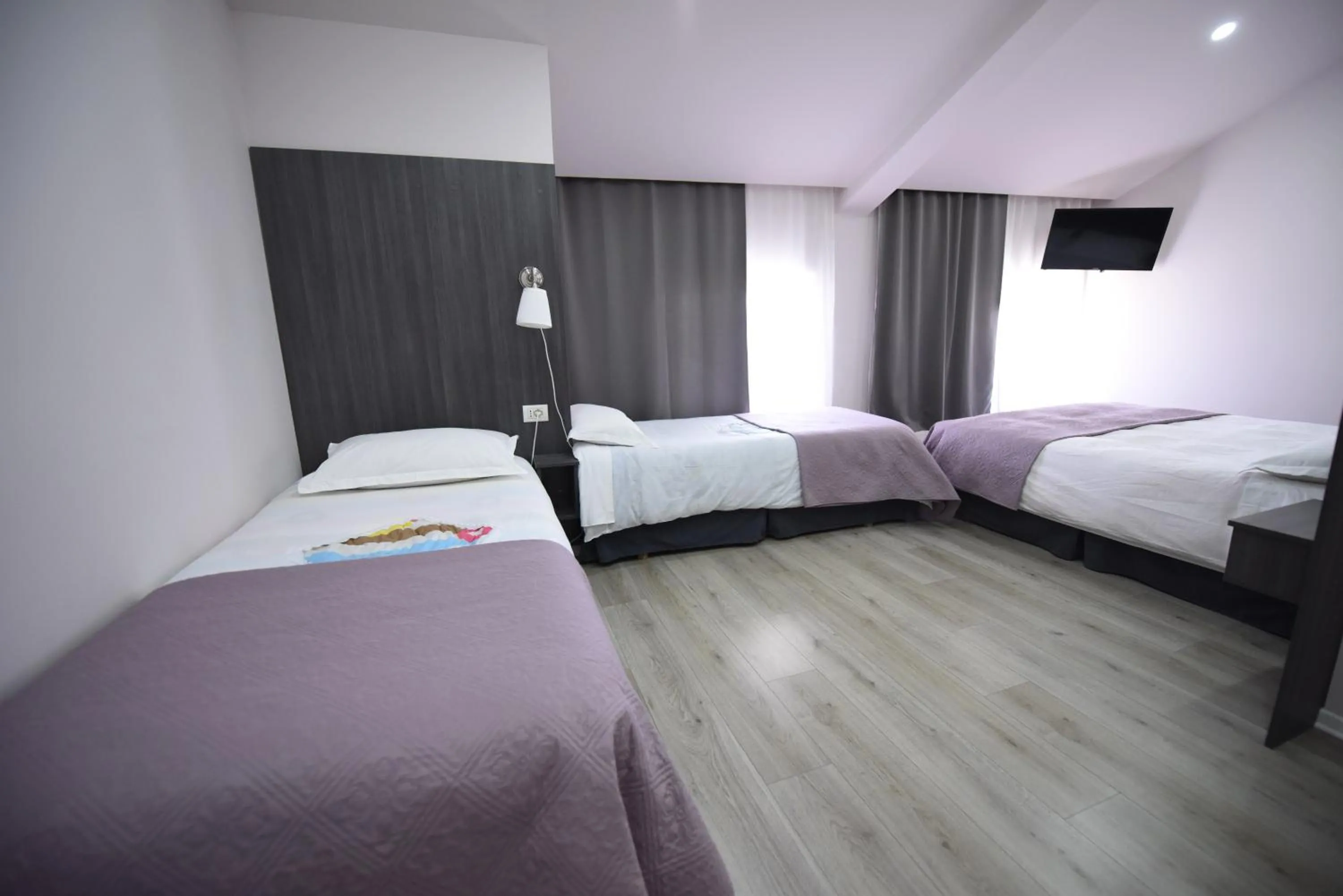 Bedroom, Bed in Rose Garden Hotel