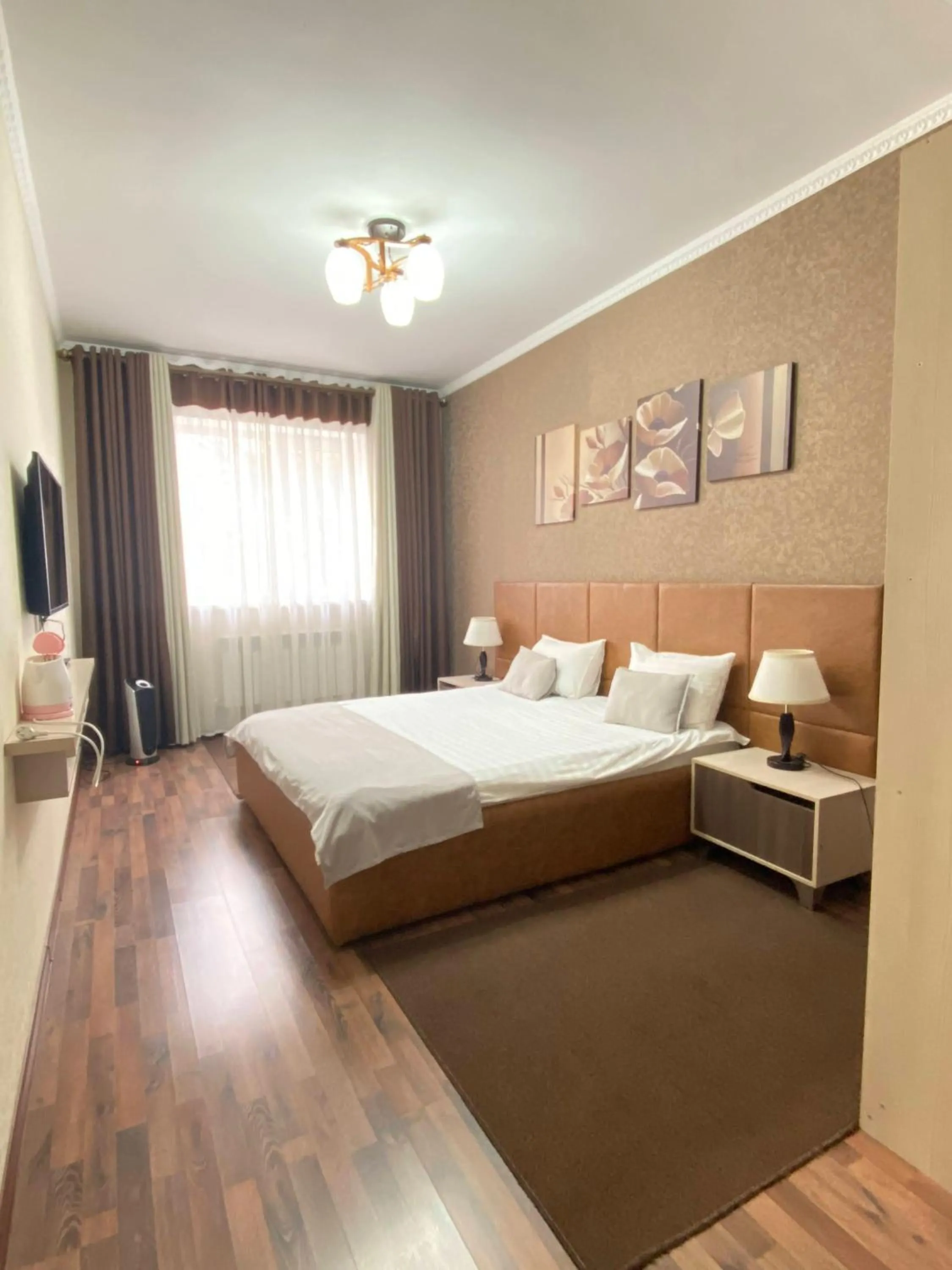 Photo of the whole room, Bed in Caravan Hotel