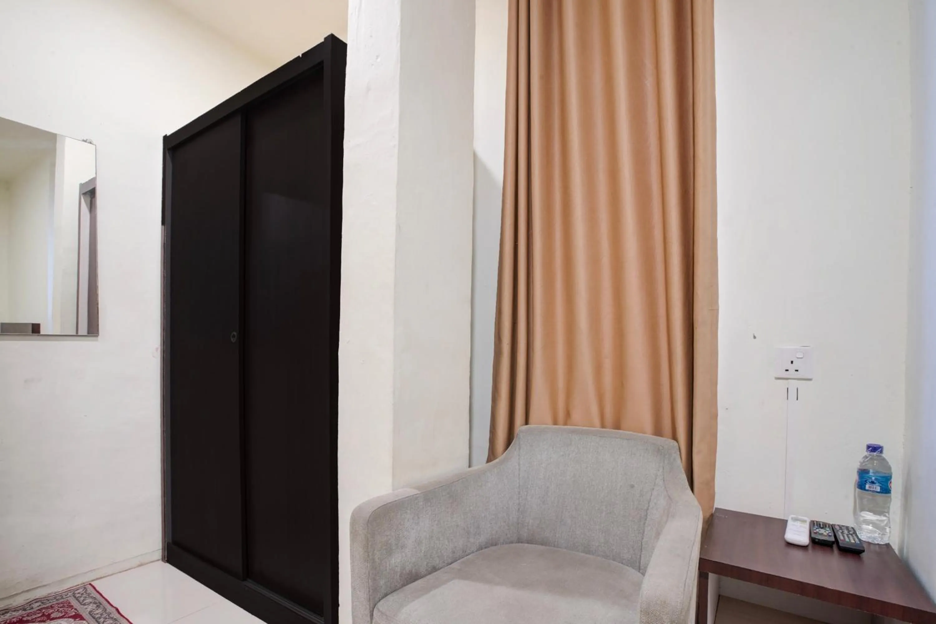 Bedroom in Collection O near Harbour Bay Mall formerly Kansa Hotel