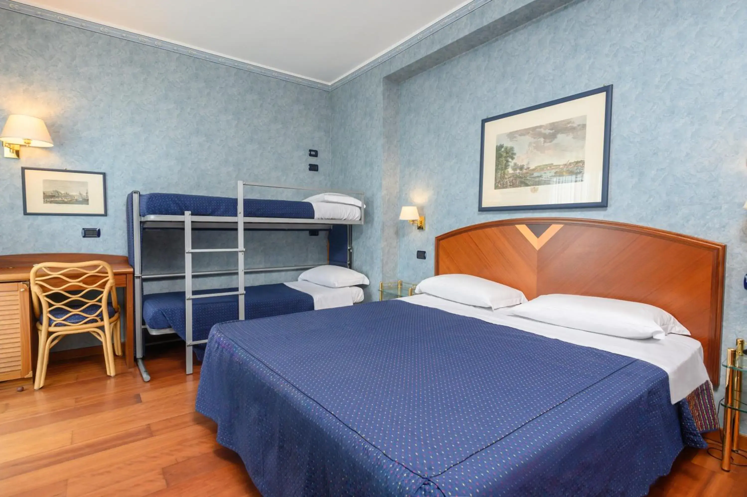 Superior Quadruple Room in Atilius Hotel & Suites Superior Quadruple Room in Atilius Hotel & Suites