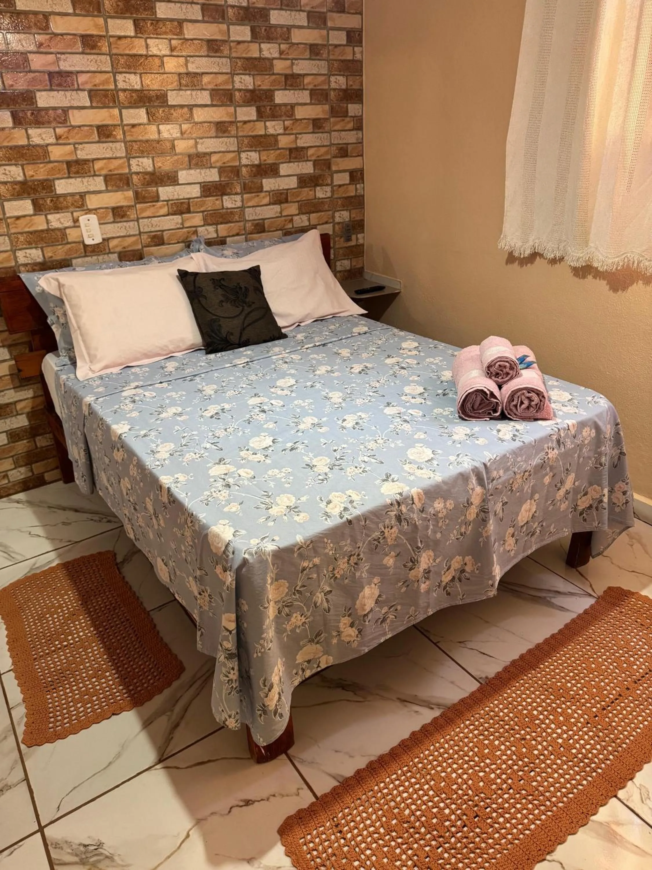 Bed in Pousada do Zezé