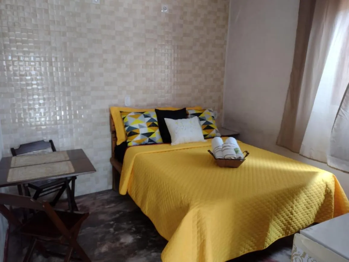 Bed in Pousada do Zezé