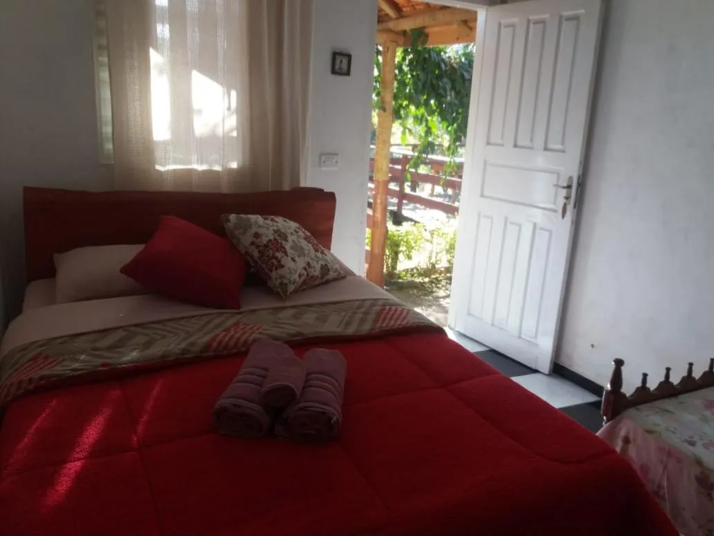 Bed in Pousada do Zezé