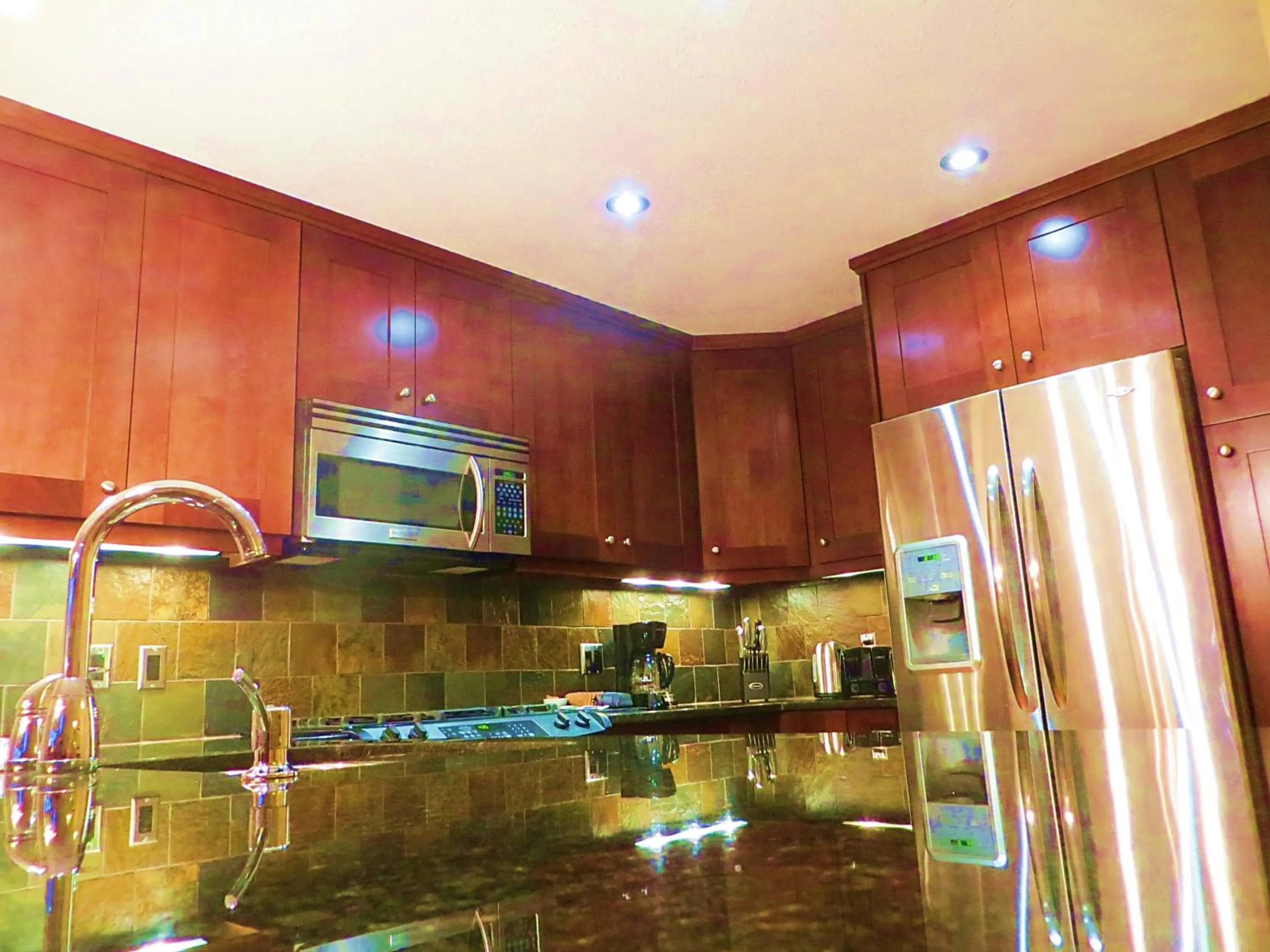 Kitchen or kitchenette in Luxury Canmore Vacations