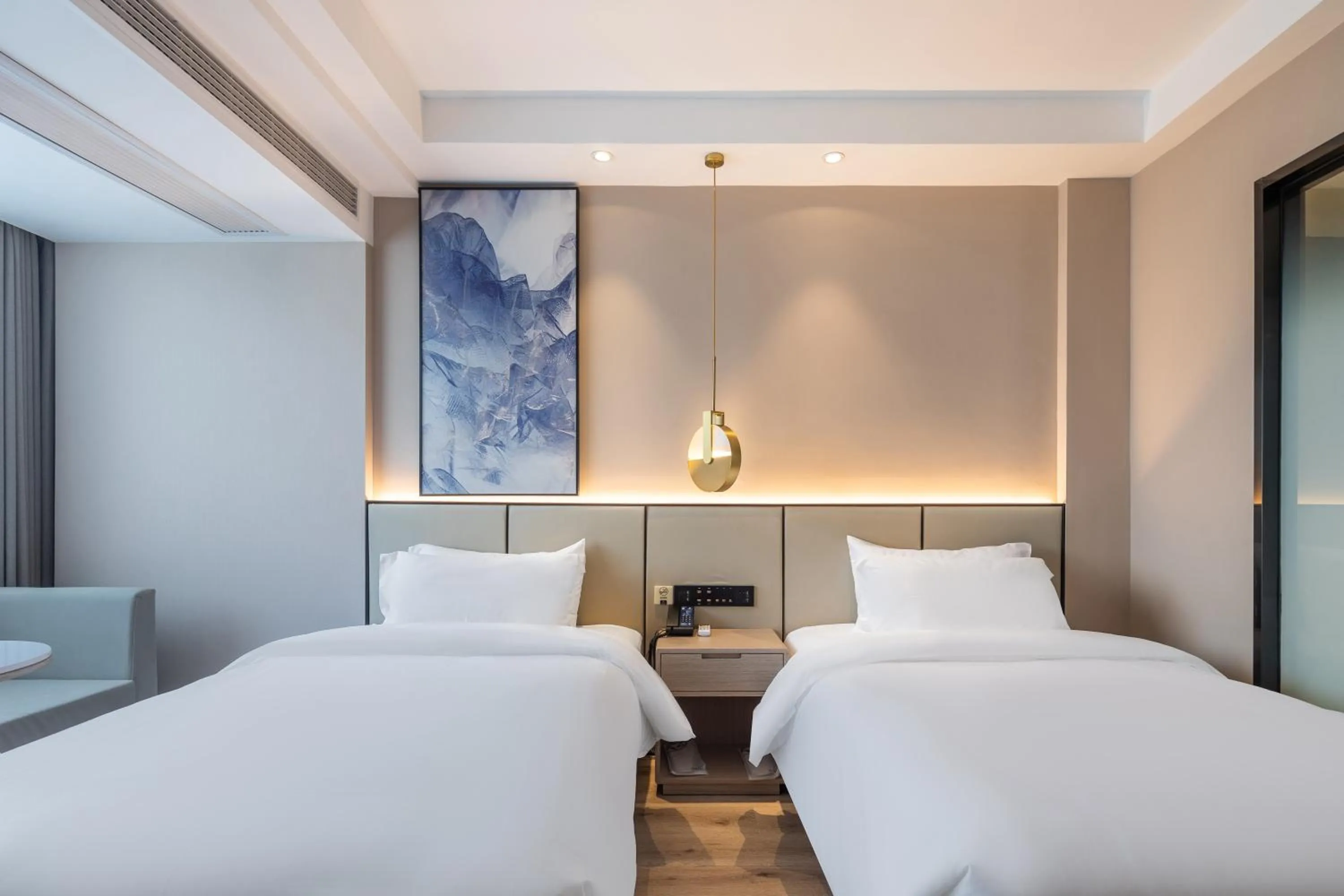 Bed in Xinhuating Business Hotel