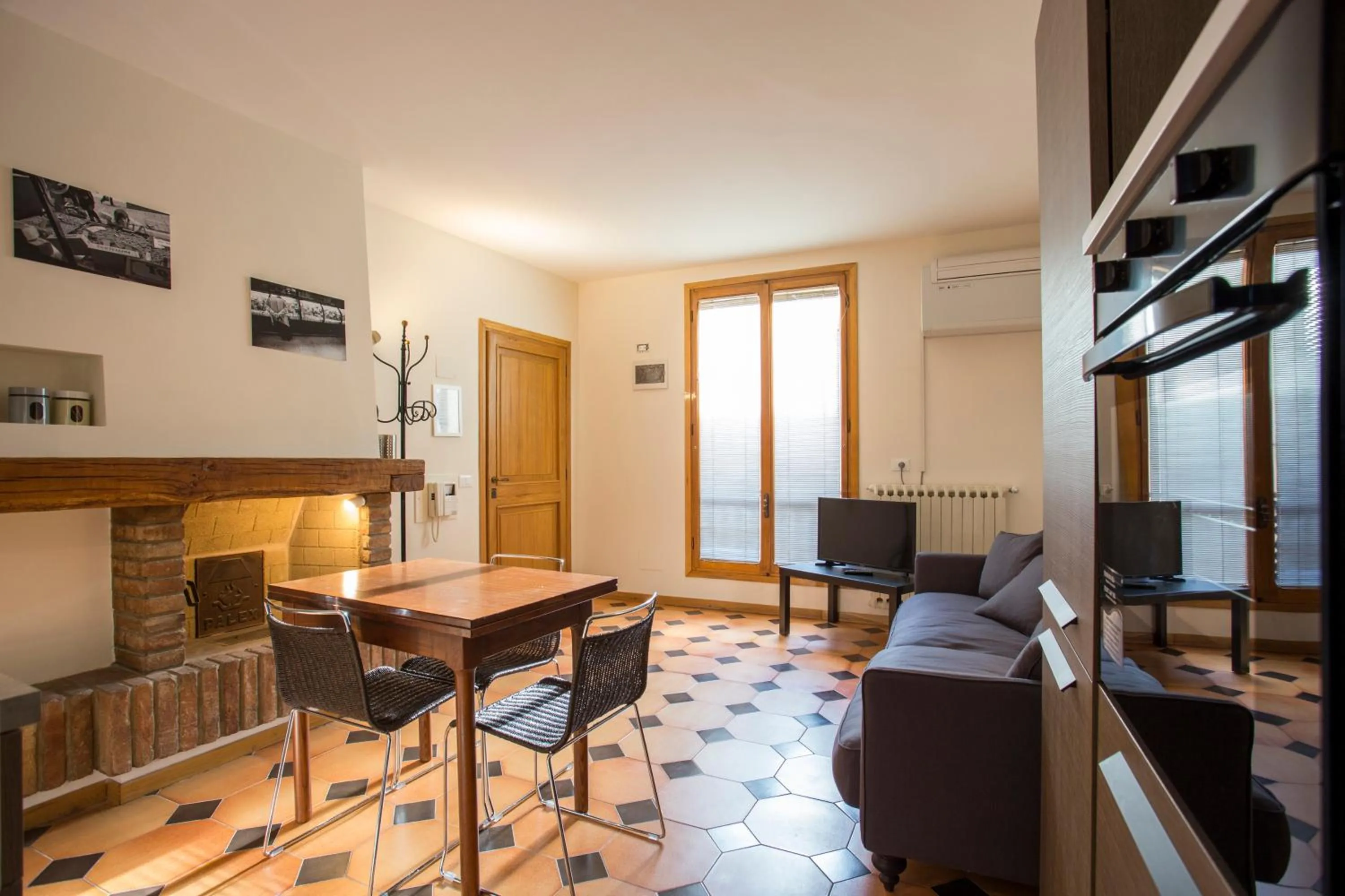 Seating area in Residenza Ariosto Depandance by Studio Vita