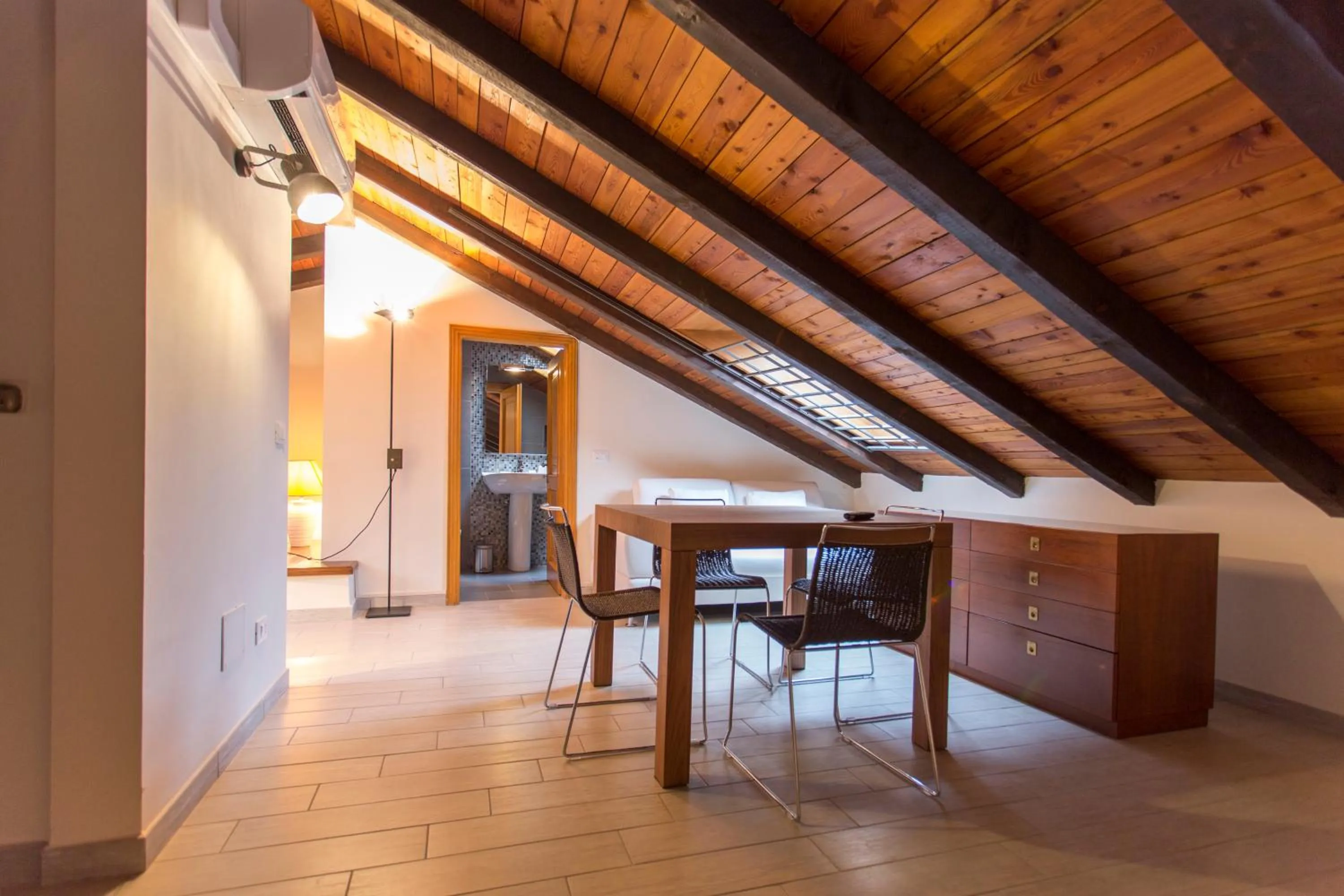 Dining area in Residenza Ariosto Depandance by Studio Vita