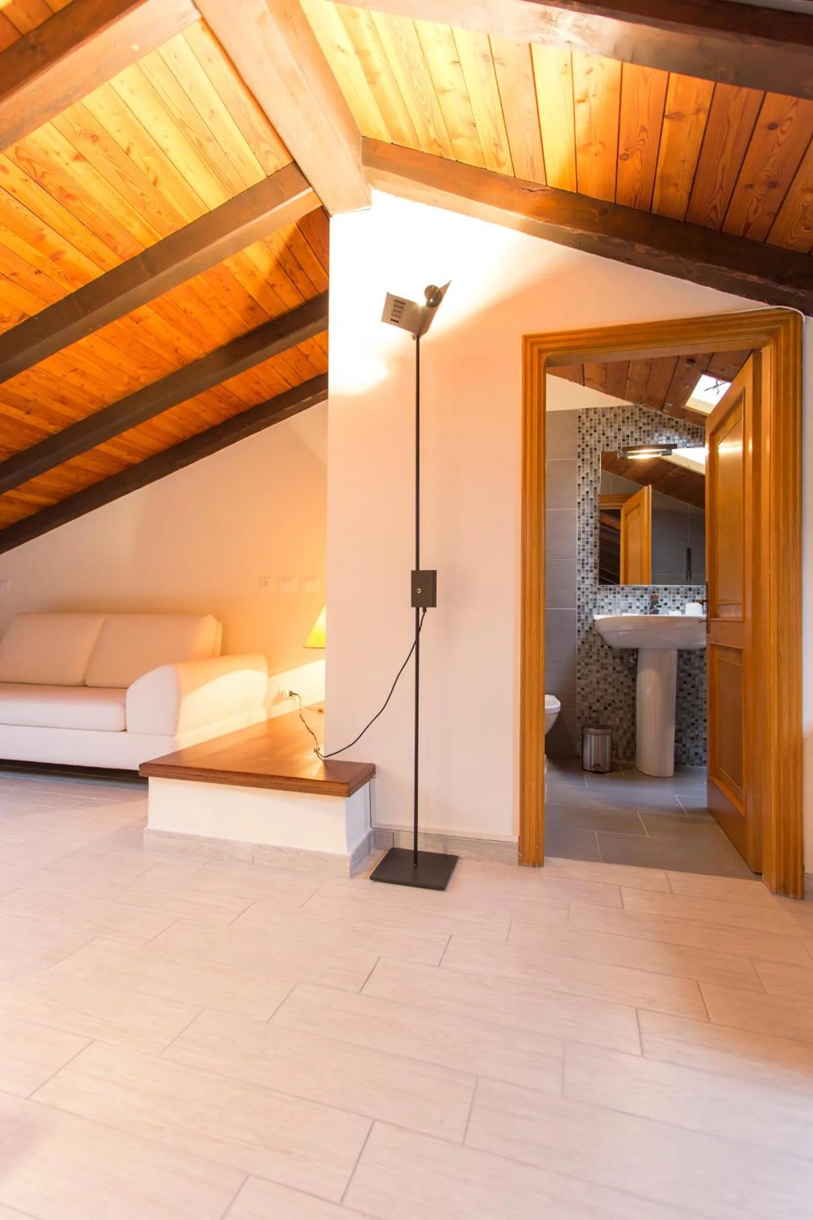 Seating area, Bed in Residenza Ariosto Depandance by Studio Vita