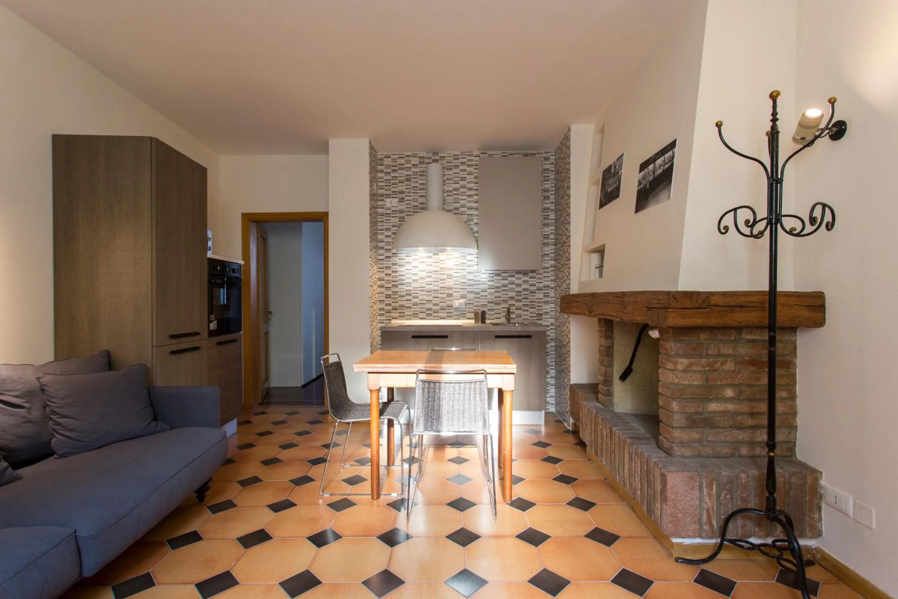 Dining area in Residenza Ariosto Depandance by Studio Vita