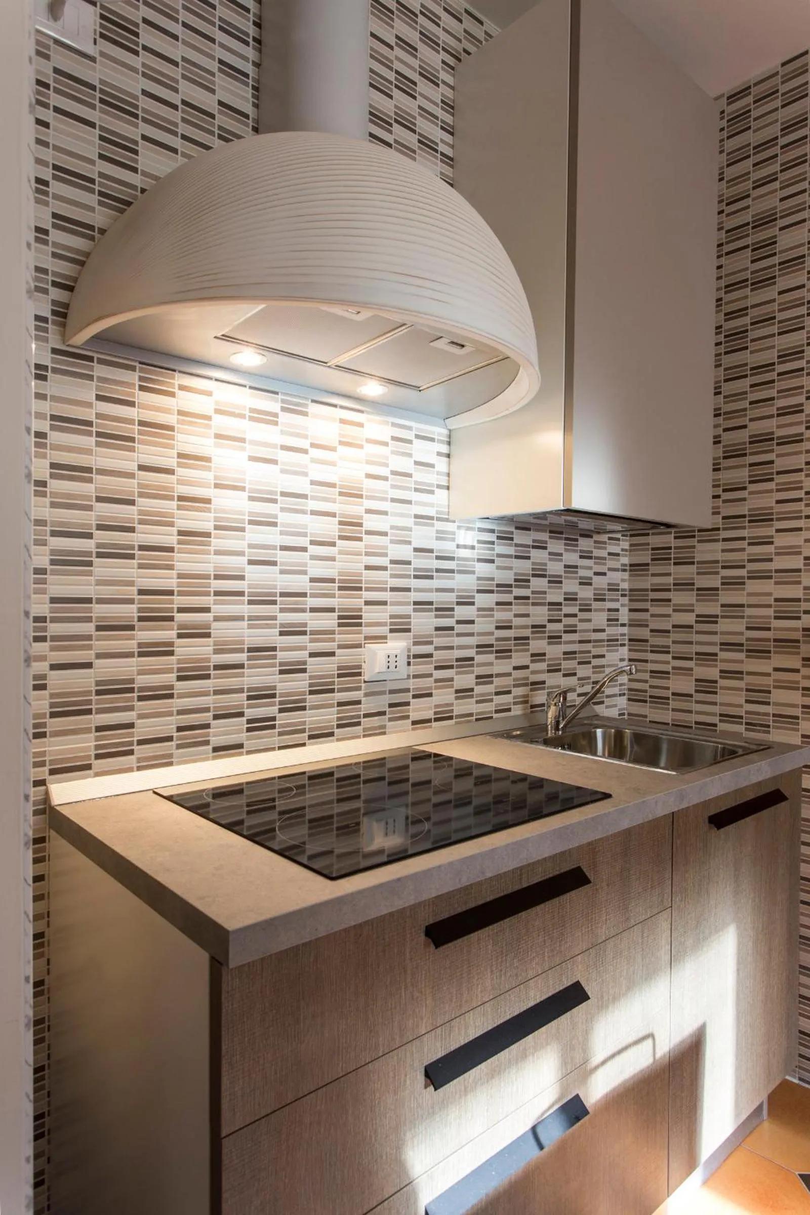 Kitchen or kitchenette in Residenza Ariosto Depandance by Studio Vita